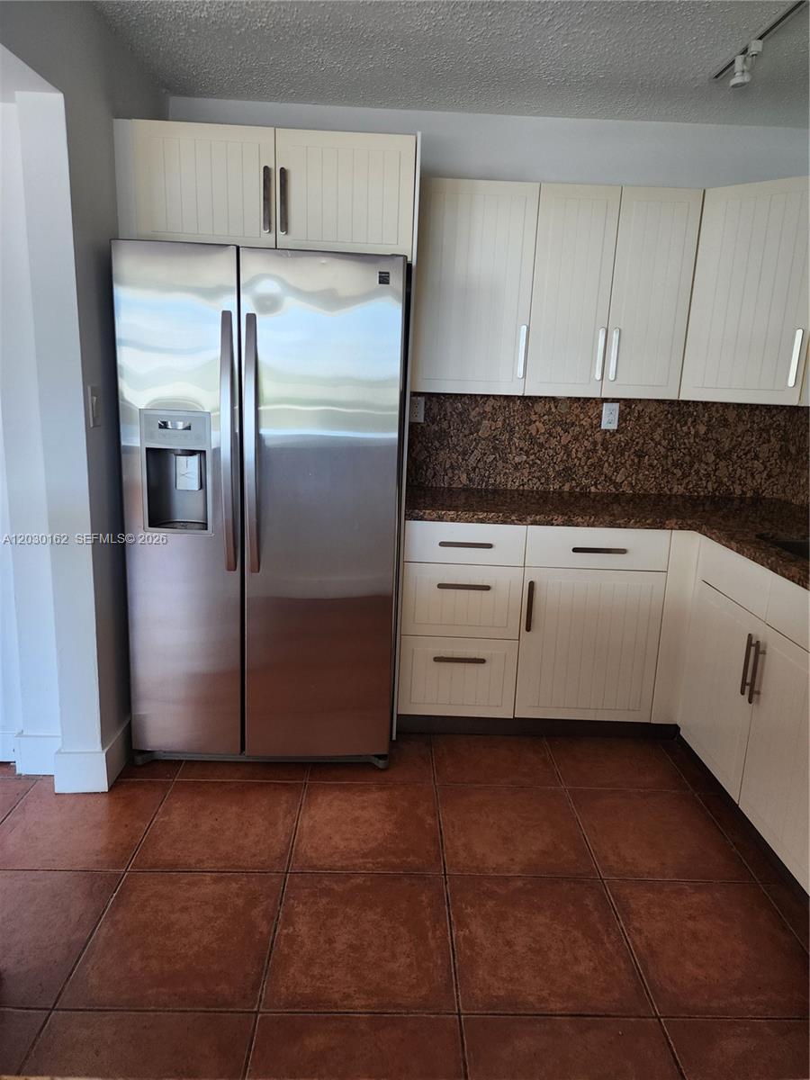 REEF EAST CONDO - Residential Lease