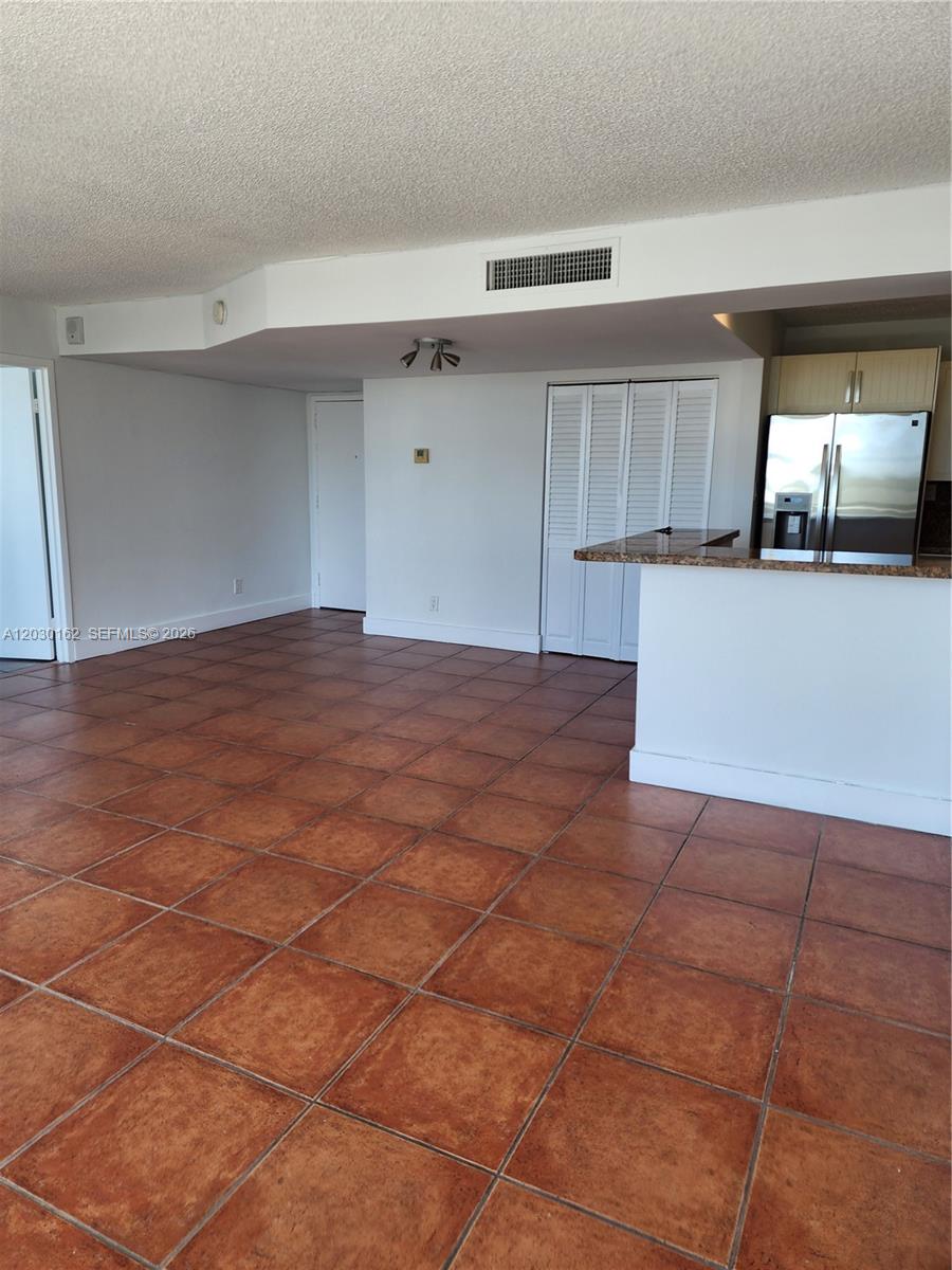 REEF EAST CONDO - Residential Lease