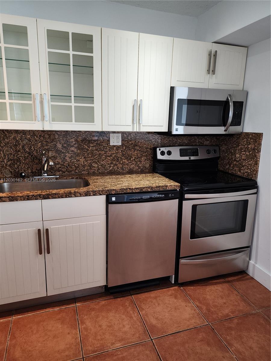 REEF EAST CONDO - Residential Lease