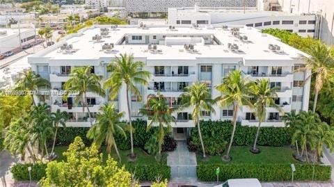 Experience the ultimate South Beach lifestyle with this beautiful top floor, large, renovated 1 bedroom condo unit!   Located in a low rise, gated building right next to Lincoln Road, you'll be within walking distance of all the best shops, eateries, clubs and more that Miami Beach has to offer! Relax and unwind in your bright 700 Sq. Ft. home featuring wood floors throughout, built out closets, renovated bathroom, updated kitchen, and cozy private balcony. The unit also boasts an assigned gated parking space as well as access to a newly renovated courtyard swimming pool area in the center of this unique urban complex. Trader Joe's, Starbucks, gyms-all these amenities are just steps away from your front door! Live the SoBe lifestyle at it's finest with this amazing opportunity. Must see!