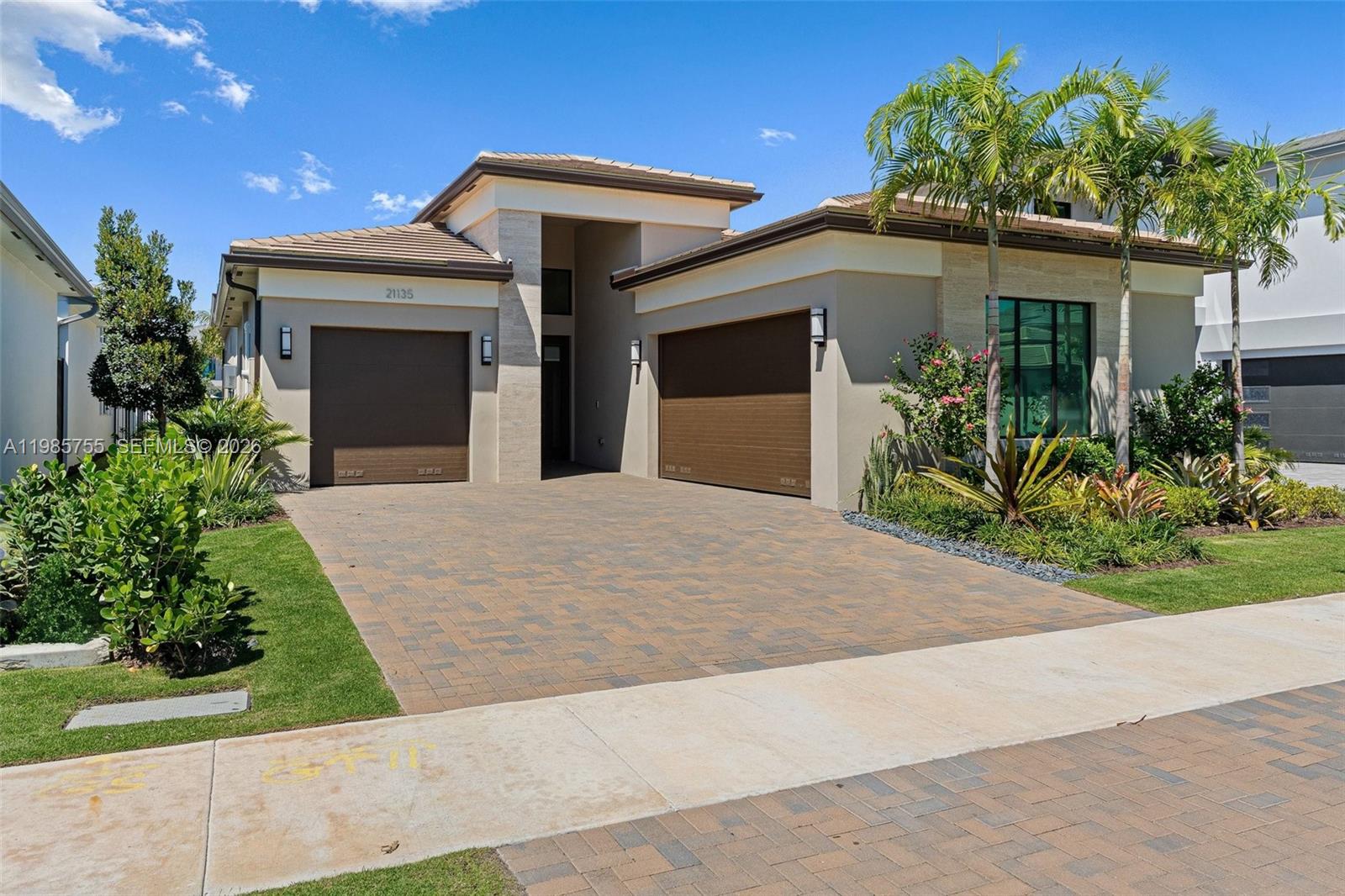 21135 Tangelo Tree Drive presents a rarely available, fully upgraded residence within Lotus Edge’s Riviera enclave—an established section offering a more complete setting just moments from the community’s new amenity center debuting April 2026.

A cohesive, professionally curated interior defines the home, with custom millwork, subtle accent features, and upgraded designer lighting carried throughout. The kitchen is thoughtfully executed with upgraded surfaces, custom-finished cabinetry, modern hardware, and a statement range hood—equal parts functional and refined.

The living and dining areas feel both elevated and effortless, anchored by a custom media wall, built-ins, and a sleek dry bar. Motorized blinds and tailored window treatments add a seamless layer of comfort and convenience.

The primary suite offers a quiet, well-appointed retreat with a custom accent wall, built-out closet, and an upgraded bath with modern finishes. Secondary spaces maintain the same consistent, elevated aesthetic.

A standout feature is the climate-controlled flex space with its own A/C and gym flooring—ideal for fitness, office, or additional living.

Outdoors, a private pool and summer kitchen complete the experience.

Refined, rarely available, and truly turn-key.
