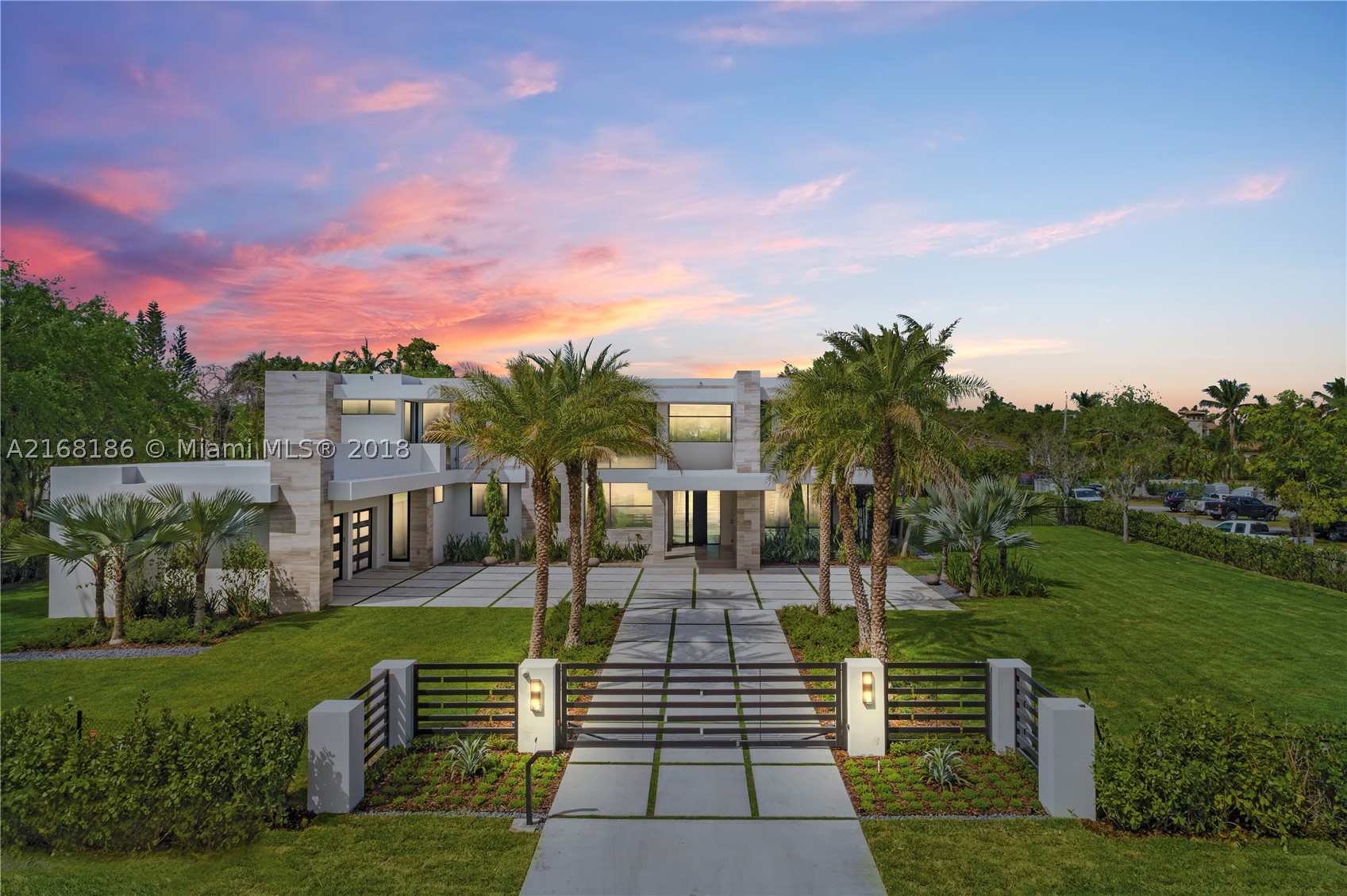 Available now-- furnished or unfurnished. (Furnishings not included in listing price). Spectacular new construction by Hollub Homes on a 50,530 sq ft lot to accommodate a N-S tennis court. Experience the ultimate in modern luxury, legendary quality and design, including integrated smart home technology, exceptional floor plan for easy and glamorous entertaining, designer European kitchen and outdoor oasis. Highlights include: Wolf, Sub-Zero & Miele appliances, Summer Kitchen, Bar, Wine room & double -sided Fireplace, Library, Master & VIP Suite, 2 Laundry rooms, and Game room. Over-sized Pool with 10 ft Stone water wall.