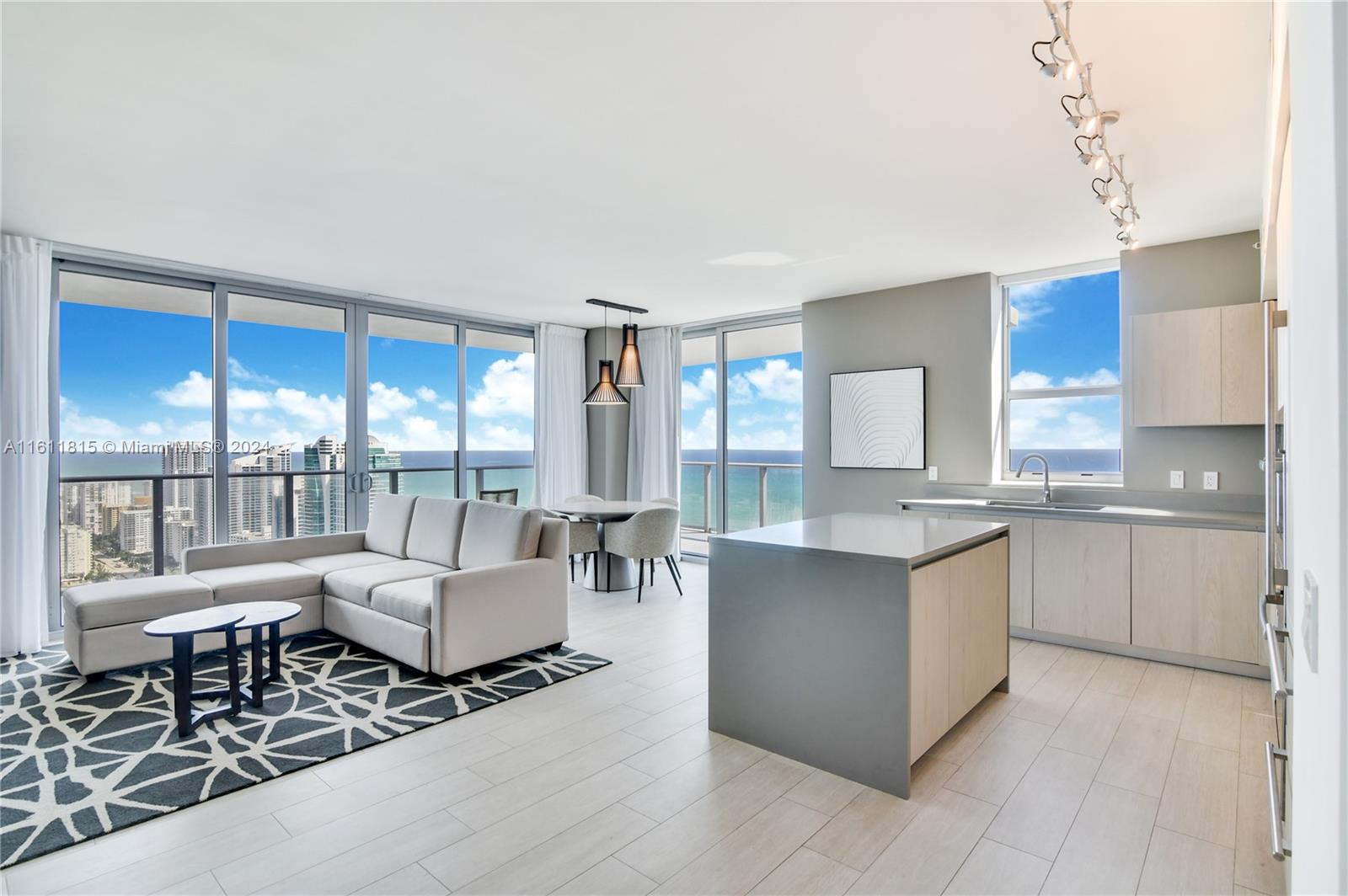 Beach-Inspired - high-rise turnkey unit with a new concept of condo-hotel 2BR 2BTH in 1225 SQFT upscale furnished with large terrace overlooking the ocean intercostal in a total of 1689 SQFT Smart Building including fiber optics for HS internet, cable TV and individual climate control systems. Residences are move-in ready with luxury finishes and oversized walk-in closet.Amenities include Semiprivate cabanas Infinity-edge pool Outdoor kitchen and dining area.Sports Club featuring an outdoor tennis& indoor racquetball/basketball court,State-of-the- art fully equipped fitness center with cardio area overlooking the pool deck and the Intracoastal and Much more- This is truly an Investor's dream. you can manage your own rentals or with the hotel program, or with any other management company