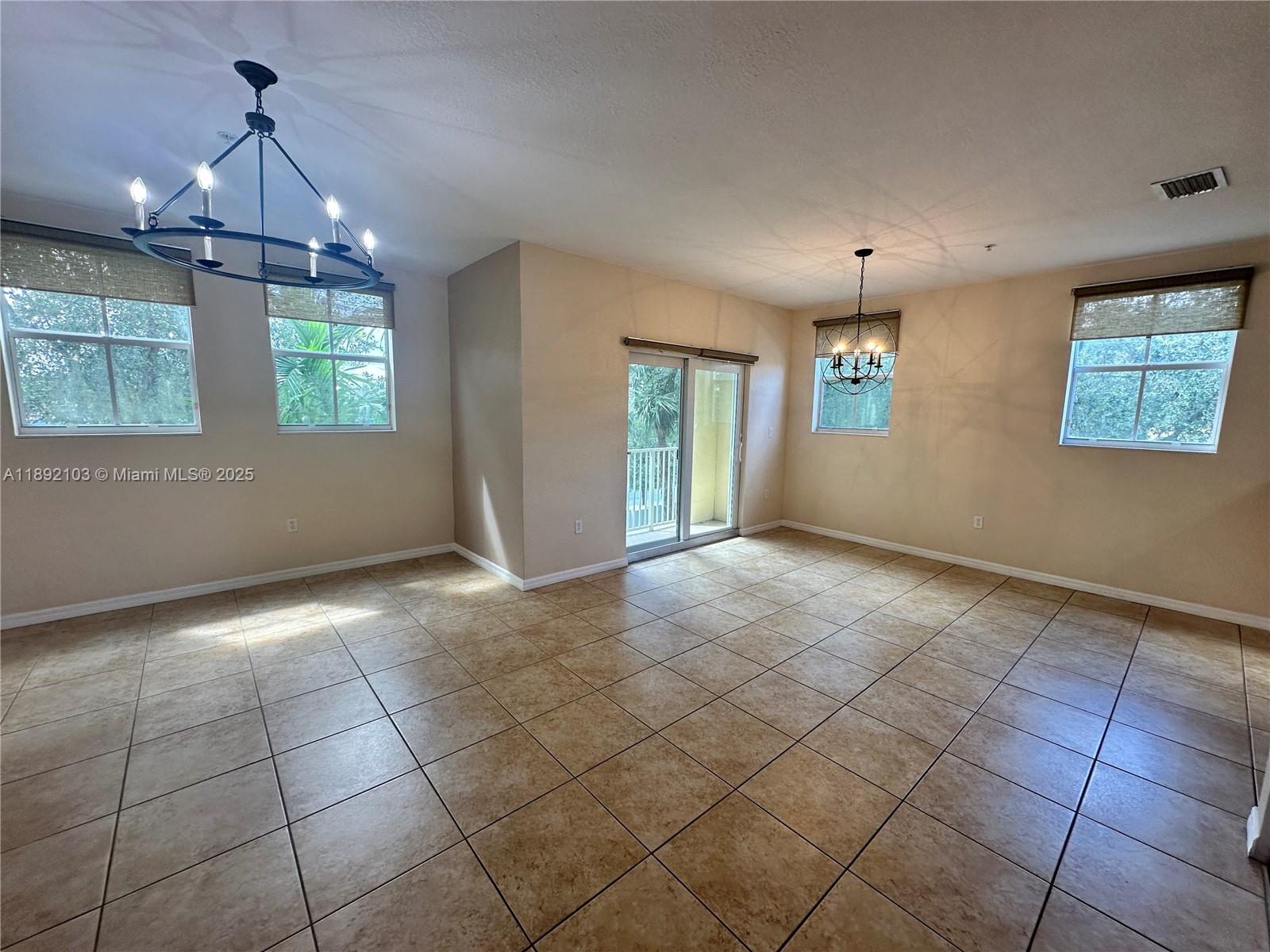 REDUCED! GREAT 2 STORY CORNER UNIT FOR SALE. FEATURES SPACIOUS OPEN KITCHEN WITH GRANITE COUNTER TOPS, FULL SIZE WASHER AND DRYER. TILED FLOORING ON THE FIRST FLOOR AND LAMINATED ON SECOND FLOOR. BEAUTIFUL GATED COMMUNITY WITH POOL, GYM, SECURITY PATROL. UNIT COMES WITH 1 ASSIGNED PARKING SPOT AND PLENTY OF GUEST PARKING. WONDERFUL LOCATION, WALKING DISTANCE TO A+ SCHOOLS, CLOSE TO FLORIDA TURNPIKE, 7 MILES TO THE MIAMI AIRPORT, NEAR SHOPPING CENTERS AND RESTAURANTS. TENANT MOVES OUT ON 02/01/26! CALL TODAY TO SCHEDULE A PERSONALIZED TOUR!