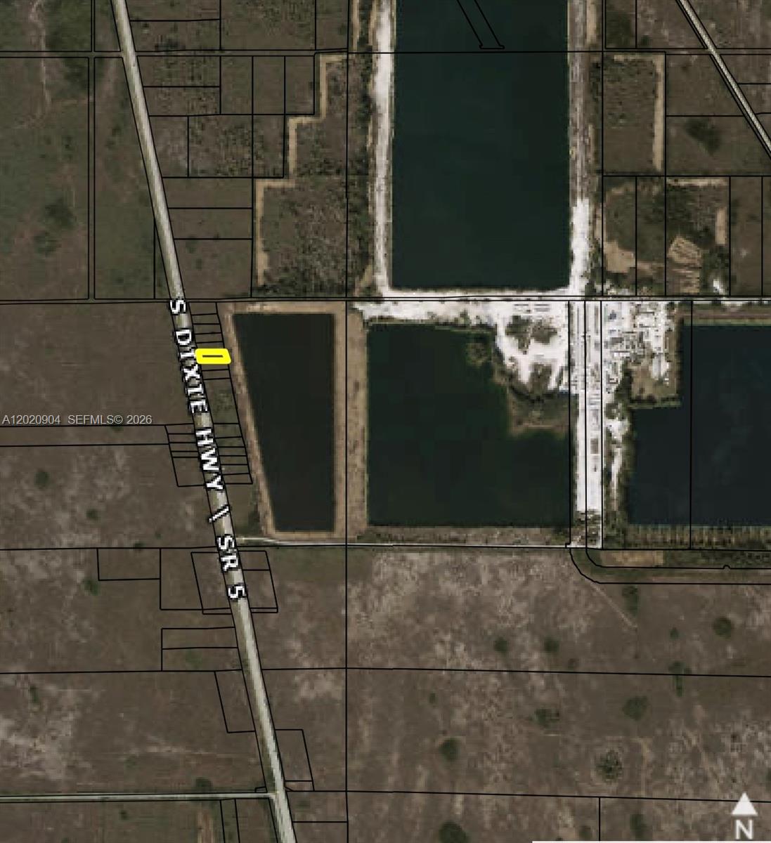 Positioned just off South Dixie Highway / US-1 in unincorporated Miami-Dade County on the way to the Florida Keys, this just under an acre vacant parcel presents a unique South Florida investment opportunity. Located near the Florida City Cemex plant and backing up to a large body of water, the property offers long-term potential in a growing corridor with privacy and natural surroundings. The lot is not currently buildable, making it ideal for land banking and future investment speculation. Convenient access to the Florida Keys and Miami adds to the property's appeal for buyers seeking affordable land with future upside potential. PA Primary Zone: 8900 INTERIM-AWAIT SPECIFIC ZONE, a temporary zoning classification used by Miami-Dade County. It signifies that the property falls under the "GU" (Interim) District while waiting for formal rezoning or comprehensive planning to determine its permanent use. Also available, an additional .69 acre lot next door.