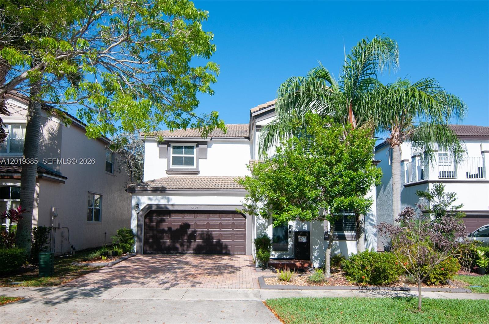 Welcome to this beautiful 4-bedroom, 2.5 bath home in the highly sought-after Riviera Isles community. This home offers peace of mind with hurricane-impact windows and doors, along with stylish plantation shutters throughout. The kitchen features a brand-new refrigerator and stove ready for your next gathering. Freshly painted just 3 years ago, this home also boasts remodeled bathrooms and a backyard with fruit trees—perfect for enjoying South Florida living. Enjoy resort-style living with amenities that include a community pool, clubhouse, gym, basketball court, and pickleball court. The home blends comfort, convenience, and community living all in one!