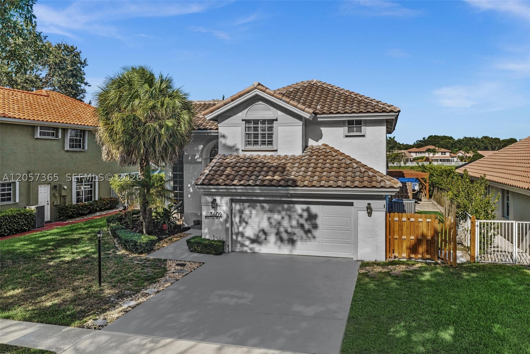 Welcome to this beautifully updated two-story lakefront home in the highly sought-after, gated community of Embassy Lakes! Featuring 3 bedrooms, 2 full bathrooms, and a spacious loft, this move-in ready home boasts 2,121 sq. ft. of bright living space with volume ceilings, ceramic tile, and laminate flooring throughout. Enjoy seamless open-concept living with a formal dining area, eat-in kitchen, and expansive family room. The upstairs primary suite offers privacy and comfort with generous walk-in closets. Step outside to your private oasis featuring a 30x15 in-ground pool, covered patio, fully fenced yard, and 79 feet of tranquil lake frontage. Complete with a 2-car garage, accordion/panel hurricane shutters, and access to top-tier resort-style community amenities including a clubhouse, pool, tennis courts, and fitness center. Exceptional Cooper City schools and prime location!