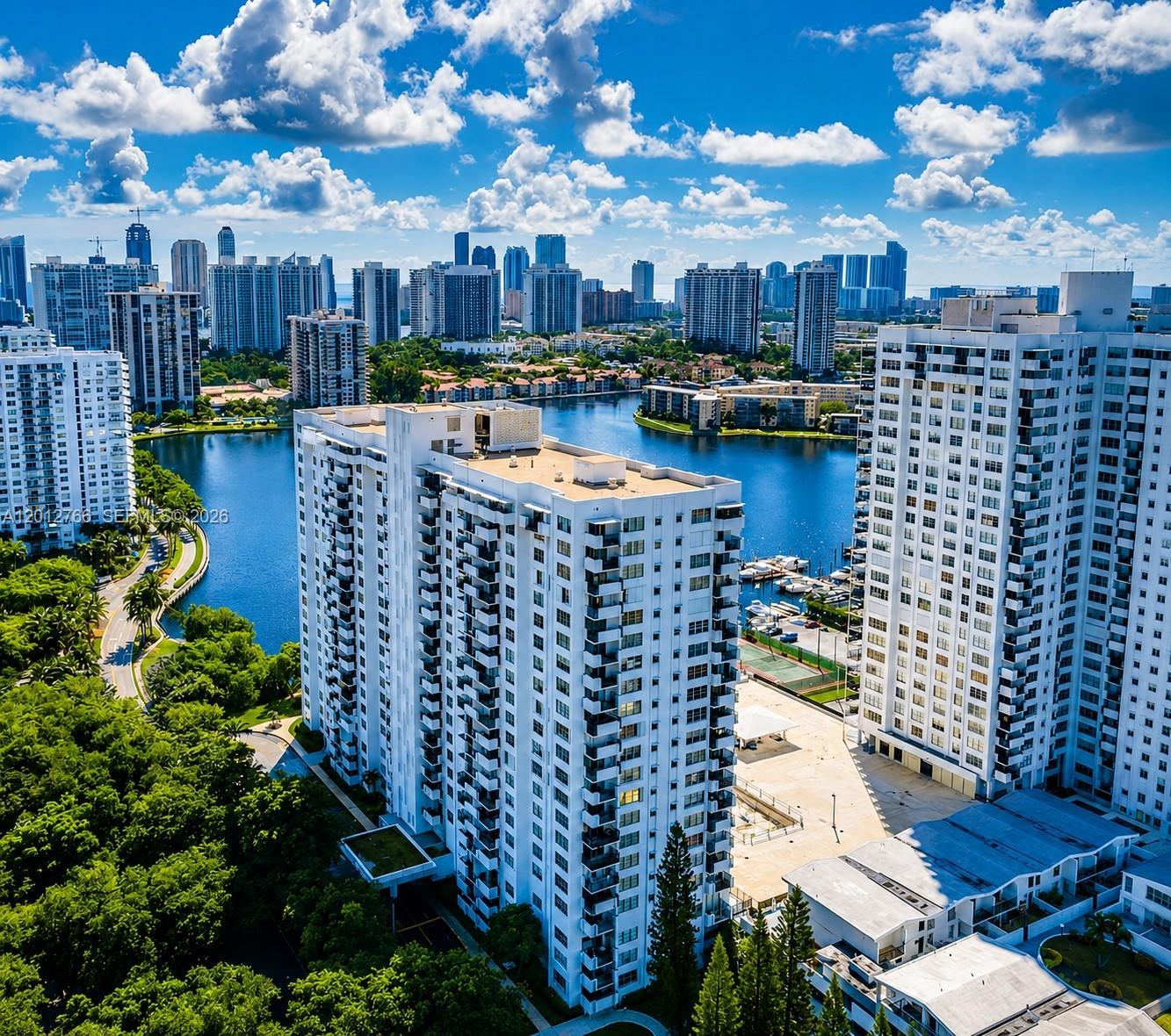 Water view side, spacious and bright 1-bedroom, 1.5 bath condo in the Commodore Plaza Aventura. Bay, city, and skyline views. Bedroom includes 2 closets, and unit has a large balcony. Resort-style amenities - 2 pools, a fully equipped gym, 2 tennis courts, BBQ area, 24/7 security, and concierge service. Located near shopping plazas, dining, and the Aventura Mall, with easy access to major highways and the Brightline train.