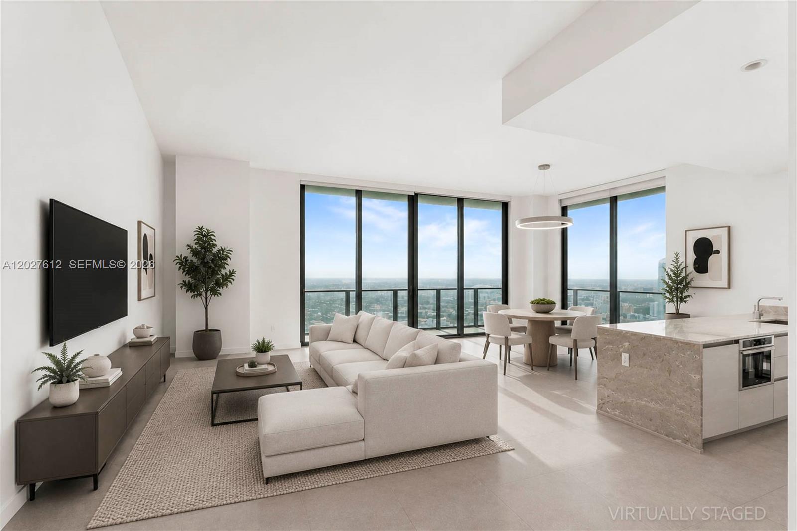 Elegant Urban Retreat: Experience elevated living in this 3-bedroom, 2.5-bathroom corner penthouse at SLS Brickell, featuring soaring 12-foot ceilings and refined modern finishes. This residence offers an open-concept layout with quartz-appointed European kitchens and breakfast bars, generous walk-in closets, and in-unit laundry, all framed by stunning city and bay views. Residents enjoy access to premium amenities including two acclaimed fine-dining restaurants, a rooftop pool, a state-of-the-art fitness center, a luxurious spa, along with 24-hour security and valet services.