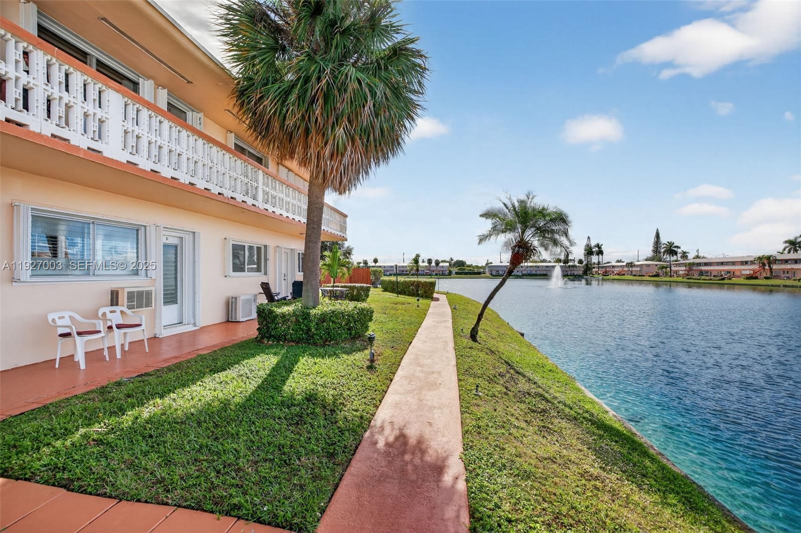 Beautiful unit with 1 bedroom & 1 bathroom in the Prime lakefront location in Rolen Lake. This one is right next to the clubhouse, offering some of the best views in the community & just steps from the pool. This bright and inviting unit showcase peaceful lake views directly from the bedroom. Enjoy a brand-new kitchen for a clean modern look, complemented by tile flooring throughout for easy maintenance. Step out your back door to stunning waterfront scenery—a perfect spot for morning coffee or evening relaxation. This unit is fully furnished and turnkey, complete with a sofa bed for guests and an in-unit washing machine. Additional upgrades include a new electrical panel, thermopump in the living room, and a wall-unit A/C in the bedroom. All work done with permits. Located in a well-maintained, HOPA-verified community, with fantastic amenities: a sparkling waterfront pool, BBQ area, shuffleboard, billiards, fitness center, and community room. Ideally situated near beaches, shopping, dining, and major highways—this is the perfect blend of comfort, convenience, and Florida living at its best!
