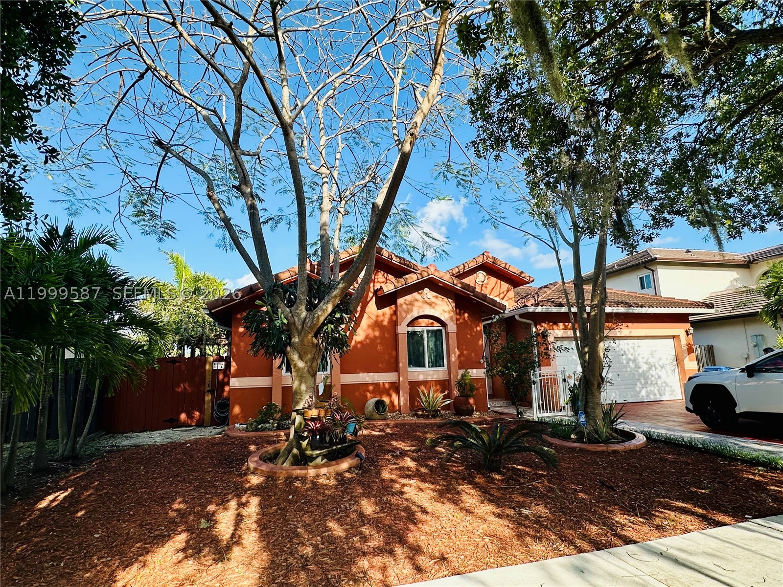 Move-in ready and meticulously maintained, this exceptional one-story, 4-bedroom home offers peace of mind with all the major updates already completed. Featuring impact windows and doors, a new roof, a new AC system, a new water heater, and a beautifully renovated kitchen with an oversized island, this home is designed for comfortable living and effortless entertaining. Step outside to your own private Tropical retreat. The spacious patio is perfect for gatherings and family event events, complete with a charming tiki hut, an 13X23 Pool and an elegant pergola. The house is ideally located just steps away from excellent schools, making it perfect for families. Close to shopping, dining and major roadways.