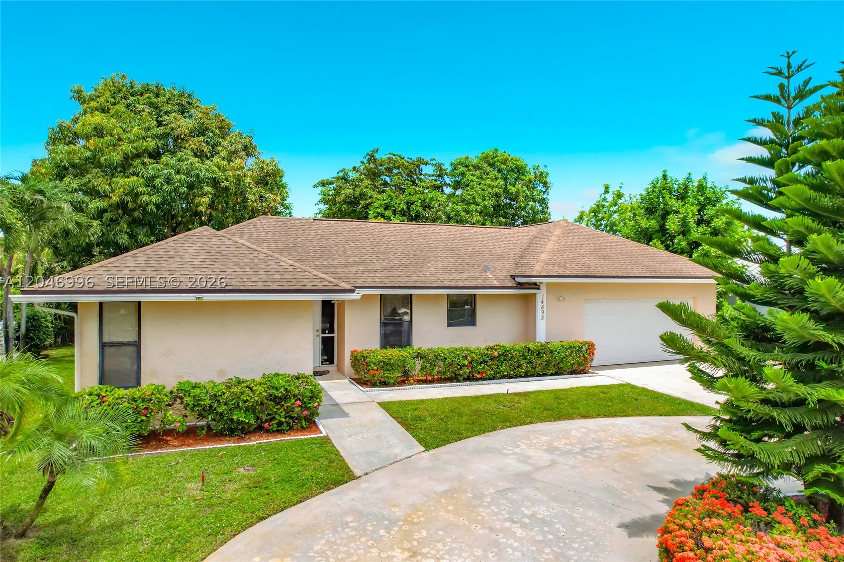 Welcome to this beautifully maintained 3-bedroom, 2-bath home in one of Delray Beach's most desirable locations! Situated in a quiet and established 55+ community, this spacious residence offers a bright open layout, tile flooring throughout, generous living areas, and plenty of room for entertaining and everyday living.

The kitchen features abundant cabinet space, a center island, opening seamlessly to the main living and dining areas. The spacious primary suite and additional bedrooms provide comfort and flexibility for family, guests, or a home office.

Enjoy the convenience and curb appeal of a circular driveway, providing ample parking for family and guests. Step outside to a large patio and private backyard surrounded by mature tropical landscaping and fruit trees, creating the perfect South Florida retreat for relaxing or entertaining.

Residents enjoy access to outstanding community amenities, including a swimming pool, clubhouse, and fitness center, offering a resort-style lifestyle right within the neighborhood.

Ideally located in the heart of Delray Beach, this home is just minutes from top shopping centers, restaurants, entertainment, major highways, and the area's beautiful beaches. Combining space, comfort, and an unbeatable location, this is a fantastic opportunity to enjoy the best of South Florida living.

Don't miss your chance to make this Delray Beach gem your own!