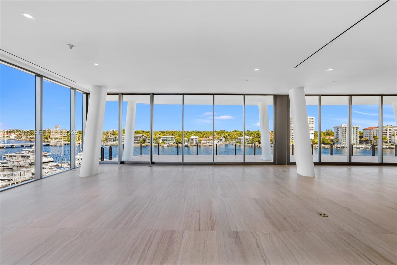 Introducing Vita at Grove Isle — Sole 504, a rare corner residence with breathtaking bay views from every room. Completed in 2026 by renowned developer Ugo Colombo, this exceptional home is set on a Coveted private 20-acre island in Coconut Grove. Spanning 4,318 interior sqft and 1,195 sqft of expansive waterfront terraces, the residence is designed for seamless indoor-outdoor living. A private elevator opens directly into the home, where floor-to-ceiling glass showcases stunning bay views and fills the living spaces with natural light.
This 4-bedroom, 4.5-baths layout features Generous Living and Dining areas, secluded primary suite, and well-appointed guest accommodations, including a junior suite. The Molteni&C kitchen pairs refined European cabinetry with premium Miele appliances, and features include Italian marble, Dornbracht fixtures, 10-foot ceilings, a Lutron lighting system, and a spa-inspired bath with steam and aromatherapy. Vita’s boutique setting of just 65 residences creates an intimate resort-style atmosphere, complete with a bayfront pool and bar, fitness center, wellness spa, and dedicated concierge services. Residents also enjoy exclusive membership to the Grove Isle Club, featuring tennis, pickleball, padel, and a vibrant social scene. The building will also debut its signature waterfront restaurant, “La Sponda,” by the team behind Daniel’s Miami. This is more than a home—it’s a private island lifestyle defined by luxury, design, and unforgettable views.