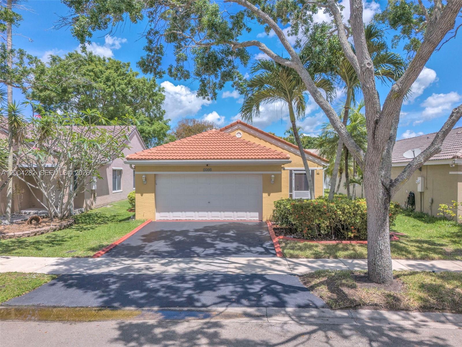 Great opportunity to live in one of the most desired towns in South Florida in a meticulously cared-for home. New roof, Spanish Style (Feb 2023) and pressure cleaned (Dec 2025). Newly painted interior (just now) and exterior (Benj Moore, 2022). New fence PVC/Vinyl (July 2025). SS appliances and a granite countertop, with upgraded cabinets.Built in accordion hurricane shutters and CCTV/ Security cameras. Bathroom sinks by Kohler 2025 and new plumbing done in 2025. Tiles in the kitchen floor and living room area, and laminated wood floors in all bedrooms. Light and airy, spacious, with the state's best-rated schools. This is a 3/2.5 bedroom, in 1,353 sf living area.