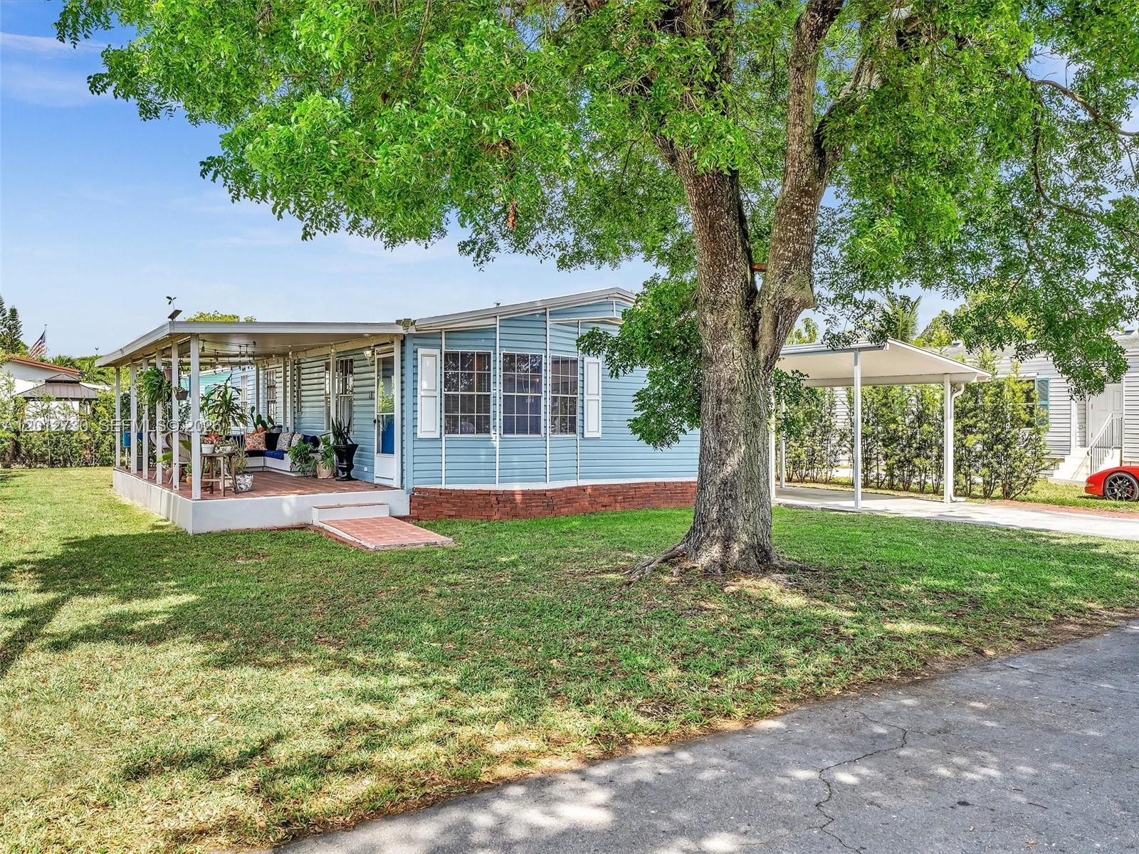 Priced to sell - Two-bedroom, two-bath manufactured home with land ownership included, located in the desirable Americana Village community. Low association fees include water and trash services. Community has a Pool, Playground and Tennis Court. Showings are fast & easy.