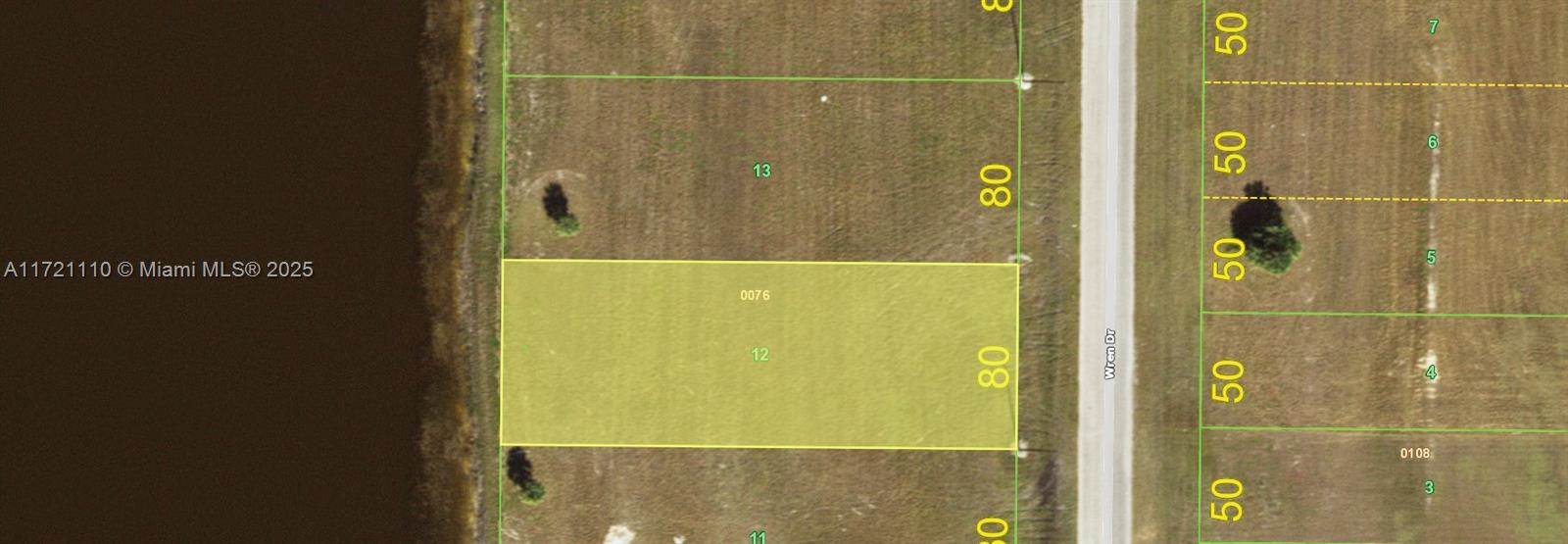 Large waterfront lot to build your dream home in the Rotonda Meadows community in Port Charlotte. Deed restricted community.Central water and sewer.