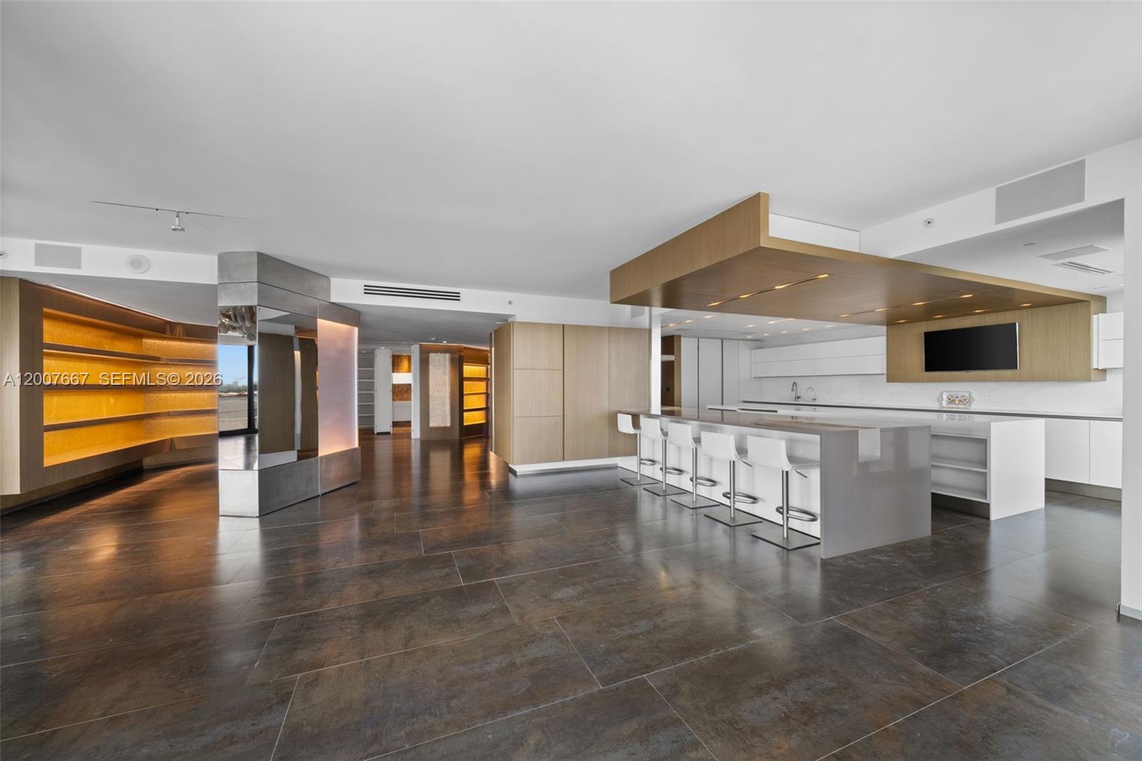 For those who appreciate art and design, this one-of-a-kind 2-bedroom, 2.5-bath residence plus den showcases distinctive style, high-design accents, and enchanting ocean and city views. The modern open-concept kitchen features Miele and Gaggenau appliances and flows seamlessly into the living area, offering an ideal setting for both everyday living and entertaining. Wraparound balconies provide the perfect setting for outdoor enjoyment. The primary bedroom is currently configured as an office. Unit 6J may be purchased together with adjacent Unit 6G. See MLS A12007666. 

Ideally situated in a prime beachfront location, Bal Harbour Tower is just moments from Bal Harbour Shops and offers great amenities and services including valet, private restaurant, security, spa, fitness, tennis courts, pool, and beach services. Exterior building envelope and balcony renovations are currently underway.
This is an estate sale subject to probate court approval. See attached Sellers Disclosure. Property is being sold AS-IS. Buyers should rely on their own inspections & due diligence. Broker makes no representations as to property condition.