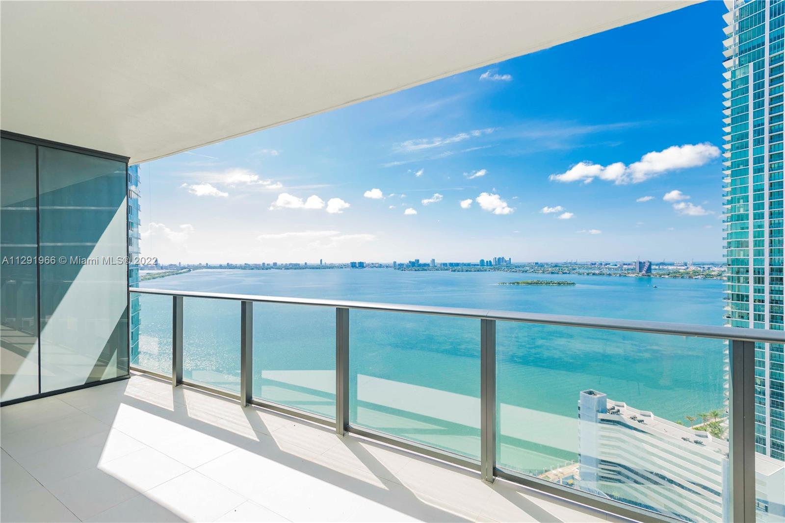 Spectacular unit at the Iconic Paraiso Bay Condo! Stunning direct bay & skyline views. 2 beds, 3 baths + den, private elevator, 9-foot ceiling heights, floor-to-ceiling sliding glass doors, oversized balcony, custom made window treatments & closets, porcelain floors, Italkraft kitchen, sub-zero & Bosch appliances, among others. Top amenities: 100 linear feet pool, Wine cellar & tasting salon, Cigar lounge with private humidors, Kid’s game room with multimedia facilities, Gorgeous party room, Movie theater with state of the art audio visual equipment, Tennis center with 2 lighted tennis courts, Outdoor grill, bay front park with marina and water sports, AMARA Restaurant by Beard Award winning Chef Michael Swchartz, & landscape design by Enzo Enea.