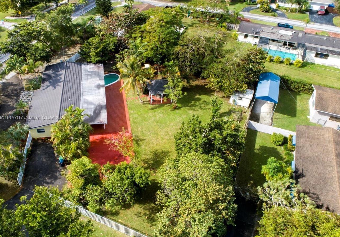 (OWNER FINANCING AVAILABLE ),
Experience the perfect blend of location and comfort with this exceptional home in the heart of the Falls area. This gated 3-bedroom, 3-bathroom residence invites you to live effortlessly and create cherished family memories. Nestled on a spacious 3/4-acre corner lot, it features a beautiful pool and a charming gazebo equipped with electricity—your sanctuary for outdoor tranquility. With quick access to The Falls Mall, you'll enjoy the convenience of vibrant living, all while appreciating the generously sized master bedroom. The private parking area behind electric gates offers secure space for your boat or RV. Recent upgrades, including a new roof, air conditioning unit, and pool pump, bring peace of mind as you embark on this new adventure.

Positioned near top-rated schools and within walking distance to The Falls, this motivated seller presents an incredible opportunity to turn your dream home into a reality! 

For more information, please contact the Listing Agent only!