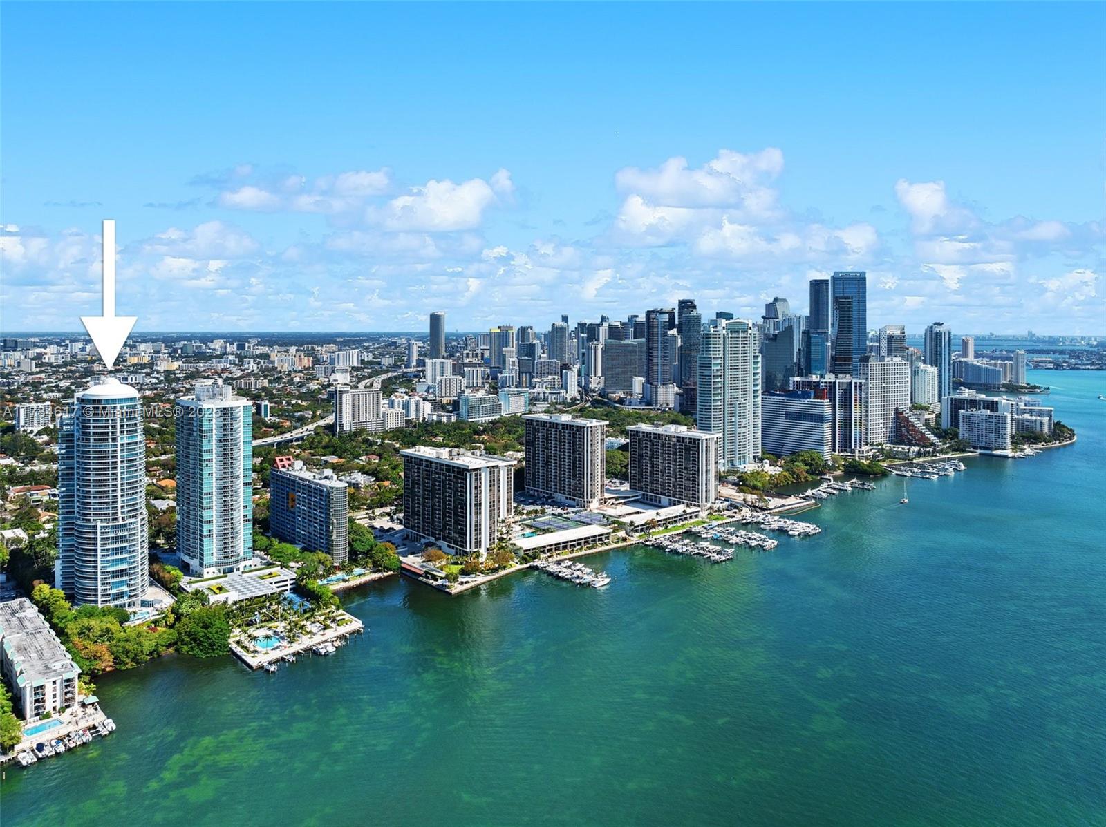 Step into an unparalleled lifestyle of elegance and luxury in this updated and spacious two bedrooms, two and a half bathroom apartment offering unobstructed views of the Biscayne Bay and the city skyline. The unit boasts with private foyer, floor-to-ceiling windows, a wraparound balcony, beautiful marble floors throughout and a bright and modern kitchen featuring Italian cabinets and top of the line Wolf appliances. In addition, for convenience and comfort, there are motorized sheer blinds and blackout curtains in both bedrooms, as well as separate laundry room and ample of closet space for storage. Five-star amenities include 24-hour concierge and security, valet, gym, tennis court and a cafe just to mention a few. This unit comes with two parking spaces, storage and a new water heater.