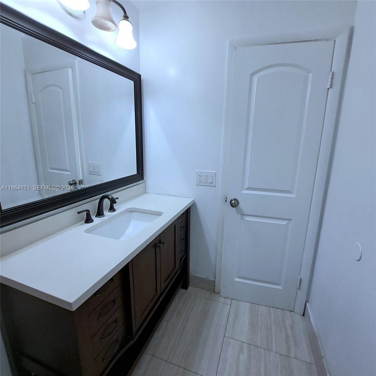 WOODSIDE ARMS CONDO - Residential Lease