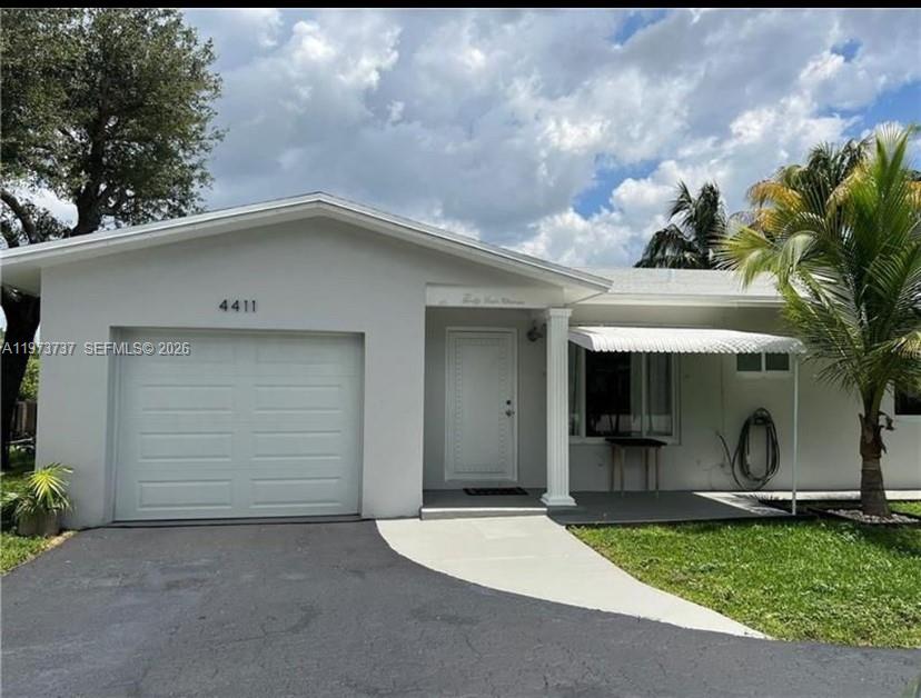 Welcome home to this newly renovated 2 bedroom, 2 bathroom, fully renovated, centrally located, waterfront home  in the heart of plantation. There is an extra room in the rear that can be used as additional living area or a 3rd bedroom. There is plenty of parking with a one car garage and large driveway. This is an entertainers dream backyard, overlooking the serene canal. The yard has a gazebo and plenty of space. New Flooring! The kitchen has been renovated with new appliances, counters and cabinets. Both bathrooms are fully renovated with new showers and vanities. If you are looking for a home in the area, this one is it. Easy to show.