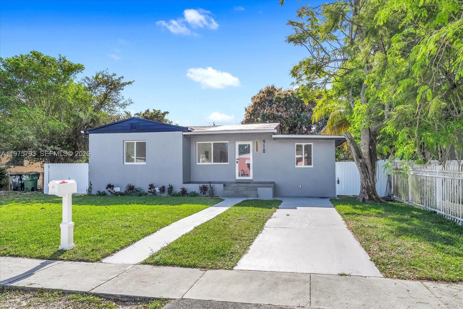 Completely renovated 3-bedroom, 2-bath + den home offering 1,340 sqft of modern living in North Miami. This move-in ready residence features new impact windows, providing both style and long-term peace of mind.

Step inside to a bright open-concept layout with oversized porcelain tile floors throughout and abundant recessed lighting. The contemporary kitchen showcases quartz countertops, custom high-gloss cabinetry, stainless steel appliances, and a spacious waterfall-style peninsula perfect for everyday living and entertaining.

Both bathrooms have been beautifully redesigned with modern tilework, frameless glass shower, and upscale finishes. The versatile den is ideal for a home office, nursery, gym, or additional lounge space.

Situated on a spacious fenced lot with mature trees and plenty of room to create your dream backyard oasis.

Conveniently located near major highways, shopping, and schools. This property is in excellent condition and ideal for FHA, VA, and conventional financing.

A true turnkey opportunity, just move in and enjoy