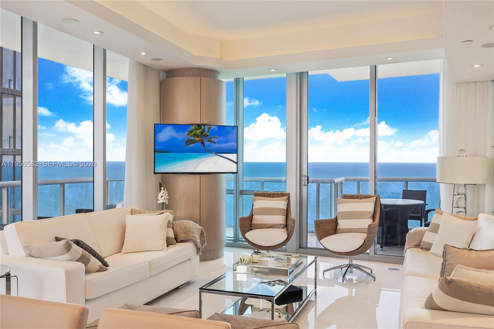 Stunning corner residence at Jade Ocean, the iconic Sunny Isles Beach tower designed by renowned architect Carlos Ott. This sophisticated 3-bedroom, 3.5-bath home spans 1,956 square feet and offers sweeping, unobstructed views of the Atlantic Ocean, Intracoastal, and city skyline.

The residence has been featured in DECOR Magazine and professionally curated by Infinity Design’s Ronny Constansi, showcasing refined interiors and thoughtful detailing throughout. Highlights include a private elevator entry, floor-to-ceiling impact glass, marble flooring, smart home technology, surround sound, automated window treatments, and premium appliances. Offered furnished or unfurnished.

Jade Ocean delivers a true five-star lifestyle with resort-style amenities, including dual infinity-edge pools, a state-of-the-art fitness center, full-service spa with relaxation lounge, private cinema, children’s playroom, 24-hour concierge, valet services, and an exclusive beach club. An exceptional opportunity to experience modern coastal luxury at its finest.