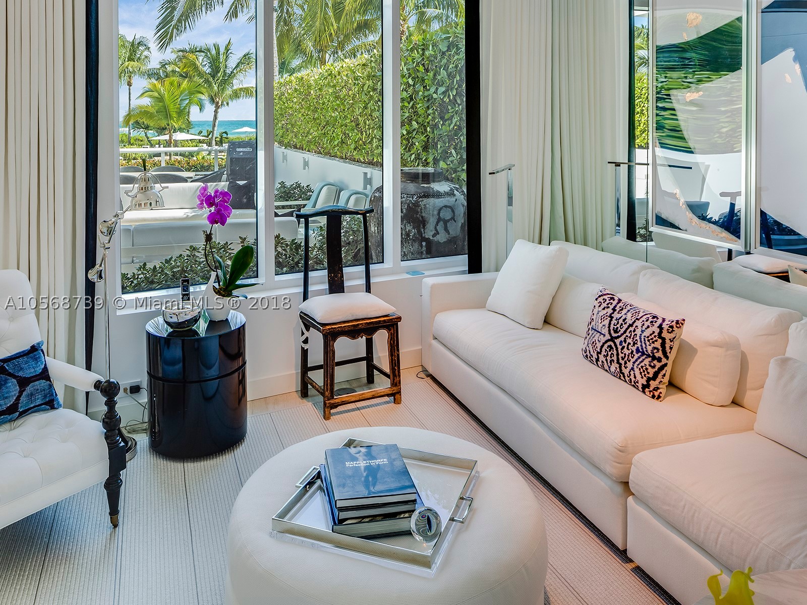This is a rare offering in The Continuum on South Beach--a professionally designed, immaculate 4-story ocean front town house with 4 bedrooms and 4.5 baths—one of only four. There are stunning, unobstructed ocean views from every level, and large indoor and outdoor entertaining spaces. This town home offers a private entrance, a sundeck with a hot tub, an outdoor gas barbecue, an elevator, top-of-the-line appliances and much more. The Continuum offers 12 acres of beachfront amenities, two lagoon shaped pools, extensive gardens, a restaurant, tennis center, gym, spa, valet, complete security –and a full staff to service every need. This is a perfect turnkey vacation home.