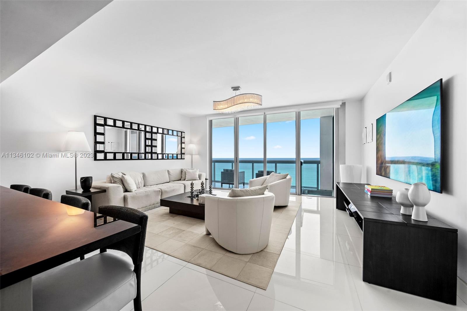 DIRECT OCEAN view split plan elegantly decorated by Saccaro in prestigious North Tower, Carillon Miami Wellness Resort, a premier oceanfront property.  Every detail for your comfort & luxury, including motorized shades; white glass floors; crystal chandeliers; pebble stone flooring in shower; Samsung 2023 85” 4K Smart Tizen TV in living room; Samsung 55” TV’s in bedrooms; water filtration system; fully equipped kitchen; outdoor table seating for 6. Classes offered 7 days week; full use of 70,000 sqft fitness center & amenities (including thermal Hydrotherapy Circuit) ALL included in rent.  Salon; 4 pools; concierge; restaurant; pool, beach service; bar; 24-hour security; valet; wellness staff. Walking neighborhood with all conveniences. ONLY OFFERED 6 MOS OFF SEASON.  NO PETS.