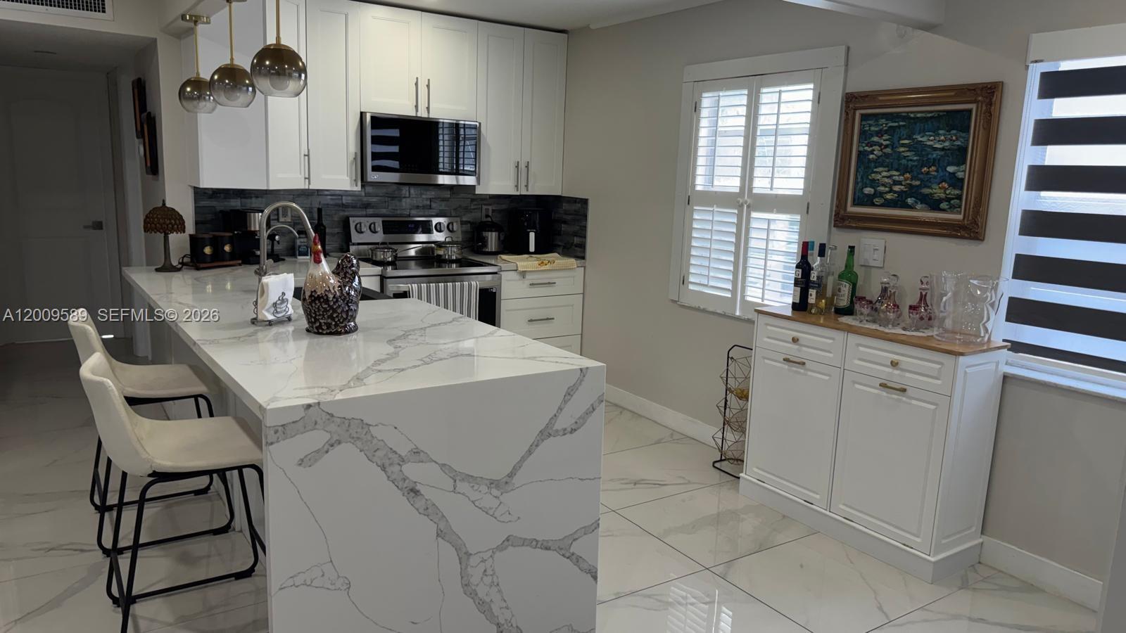 Beautifully remodeled 2-bedroom, 2-bathroom apartment located in the desirable Normandy section of Delray Beach. This unit features a modern open layout with updated flooring, a renovated kitchen with sleek cabinetry and countertops, and upgraded bathrooms with contemporary finishes.
Enjoy abundant natural light, spacious bedrooms, and a private, peaceful setting. The community offers well-maintained grounds and amenities, perfect for a relaxed South Florida lifestyle. Conveniently located just minutes from shopping, dining, and major highways, and a short drive to the beach.
Move-in ready and perfect for year-round living or a seasonal retreat.