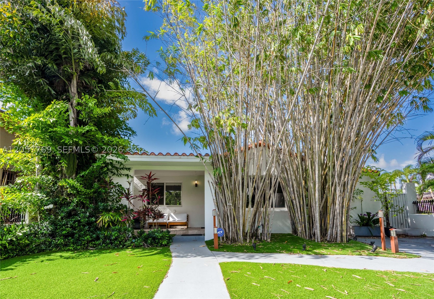 Beautifully updated 3-bedroom, 3-bath with private office residence offering approximately 2,530 SF of bright, open living space in the highly desirable Shenandoah neighborhood. This move-in-ready home blends timeless charm with modern upgrades in an exceptional location just minutes from Brickell, Coral Gables, Coconut Grove, Key Biscayne, Downtown Miami, Miami International Airport, major highways, top-rated schools, hospitals, shopping, and dining. The thoughtfully designed floor plan features spacious living and family rooms, and abundant natural light throughout. The modern kitchen includes brand-new stainless-steel appliances, a gas range, stone countertops, and ample cabinetry, The oversized primary suite features a custom walk-in closet, direct backyard access, and a flexible area ideal for a home office, gym, or sitting room. The additional bedrooms offer custom closets, and the updated bathrooms provide a clean, contemporary design. Recent upgrades include a brand-new roof, impact windows and doors, and an electric gate. The inviting front porch sits behind a secure gate, creating a private entrance. Enjoy a large, fully fenced backyard with room for a pool and outdoor entertaining.  Located on a rapidly transforming street with newly built luxury homes, this property offers exceptional value and long-term appreciation potential. A rare opportunity to own a beautifully updated home in one of Miami's most desirable and centrally located neighborhoods.