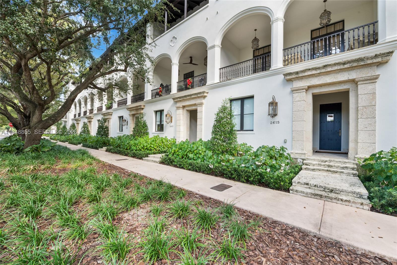 Better than new, fully furnished Biltmore Row luxury townhome in the heart of Coral Gables. This three-level residence with elevator offers 4 en-suite bedrooms, 4.5 baths, and a rare 4-car garage with electric vehicle charging outlets. The main level features a stunning waterfall marble kitchen island, custom cabinetry, premium appliances, and a separate, discreet dirty kitchen ideal for entertaining. Light-filled interiors showcase soaring ceilings and exquisite finishes throughout. Enjoy seamless indoor-outdoor living with three private outdoor terraces, including one with a summer kitchen. Truly move-in ready, offering the ease of new construction with elevated design and style.