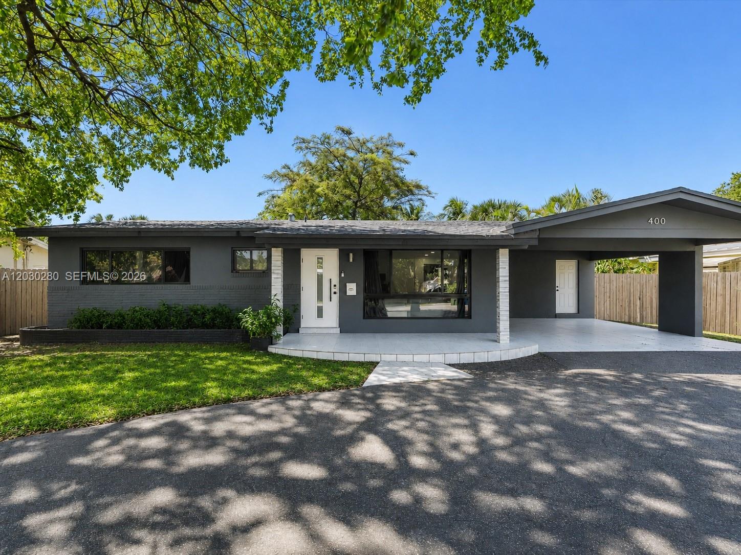 Available Now! Experience waterfront living in the heart of Wilton Manors with this beautifully remodeled 4-bedroom, 2-bathroom home offering modern upgrades, functional living spaces, and an incredible outdoor setting. Thoughtfully updated throughout, the home features stylish new flooring, a contemporary kitchen with stainless steel appliances, custom cabinetry, and remodeled bathrooms with mirrored vanities and sleek finishes.

The spacious and functional layout is ideal for both everyday family living and entertaining, with bright open-concept living areas that flow seamlessly to the backyard. Step outside to your own private tropical retreat featuring a huge backyard, 70 feet of water frontage, and a private dock overlooking the canal — perfect for relaxing, kayaking, paddle boarding, or enjoying the South Florida lifestyle. There is also ample space to add a pool and create the ultimate outdoor oasis.

Ideally located just minutes from Wilton Drive’s vibrant dining, shopping, nightlife, parks, and entertainment, as well as nearby beaches, downtown Fort Lauderdale, and major highways. This move-in-ready waterfront home offers the perfect combination of modern comfort, location, and lifestyle.
