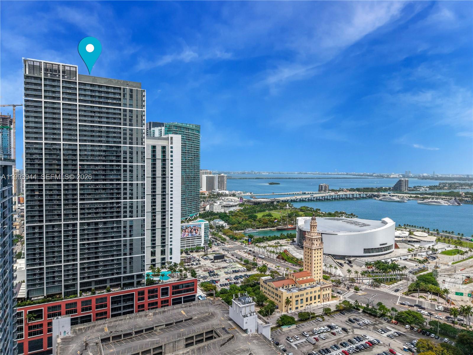 Experience elevated urban living in this impeccably designed 1-bedroom, 1-bath residence at Gale Miami, offering 612 sq ft of refined, light-filled space. Delivered fully furnished and turnkey, this sophisticated home blends modern elegance with effortless functionality. Floor-to-ceiling impact windows flood the residence with natural light, while the open-concept layout seamlessly connects living, dining, and kitchen spaces. A private balcony reveals partial views of Biscayne Bay alongside sweeping panoramas of the Miami skyline—an ideal backdrop for both relaxation and entertaining. Approved for short-term rentals (Airbnb/VRBO), this residence offers exceptional flexibility as a personal retreat, income-producing asset, or hybrid lifestyle investment. Ownership is further simplified with 2026 HOA dues already paid. Residents of Gale Miami enjoy access to over 70,000 sq ft of curated, resort-style amenities, highlighted by a state-of-the-art fitness center that rivals private athletic clubs—featuring top-tier equipment, expansive training zones, and inspiring panoramic views of the city and bay. Additional amenities include a rooftop pool with skyline vistas, a dedicated yoga and wellness lounge, sophisticated co-working spaces, curated on-site dining, and full-service concierge and security. Perfectly positioned in the vibrant core of Downtown Miami.