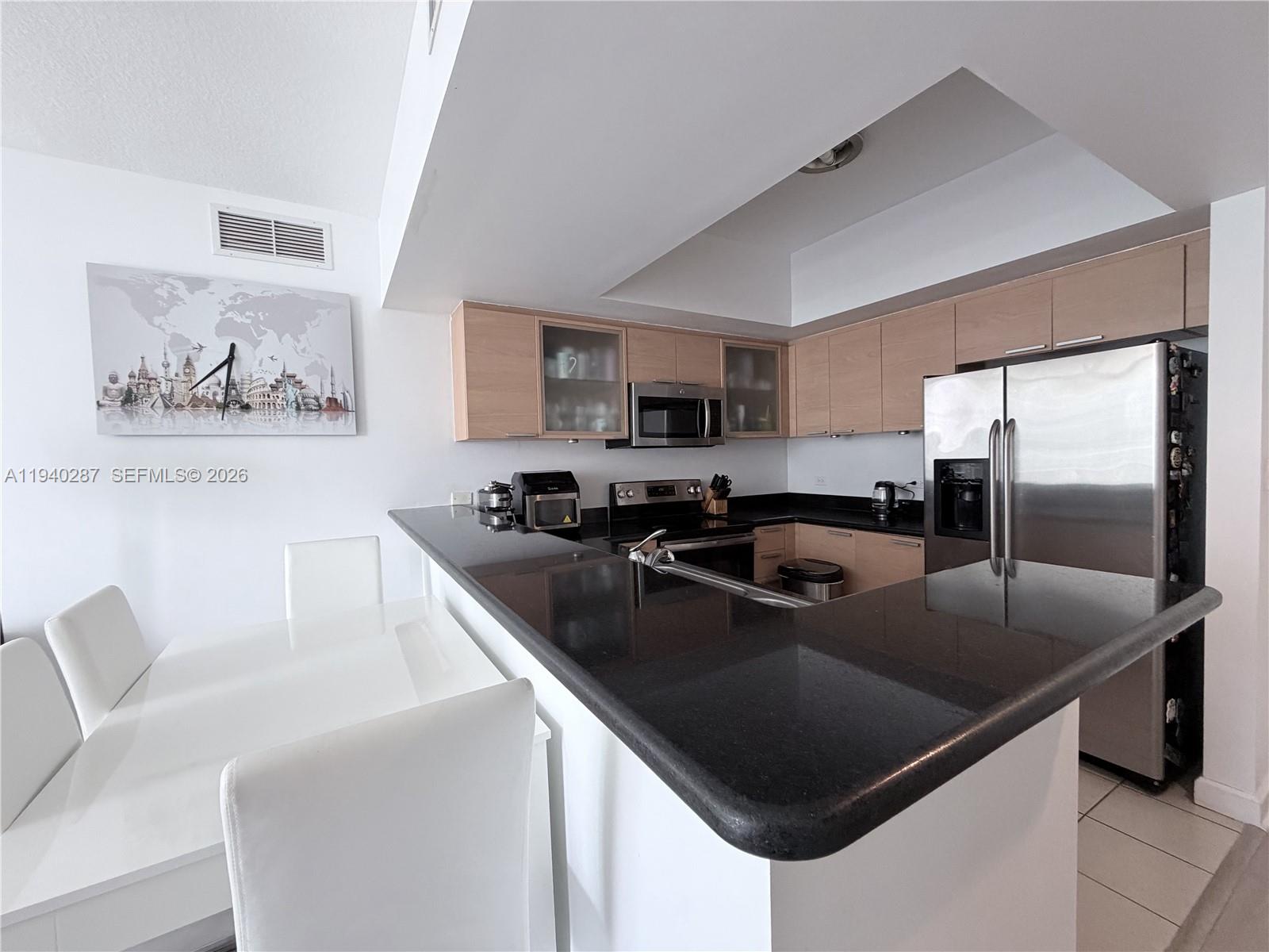 Beautiful, move-in ready, and very bright 2-bedroom, 2-bath residence with two assigned parking spaces in a luxury condominium. Located on the 7th floor, this unit offers an open and airy layout with abundant natural light, a direct pool view, and a private balcony with impact windows. Recently updated with new flooring and a brand-new A/C system.

Building amenities include a heated pool, fully equipped fitness center, billiard and TV room, 24-hour attended lobby, secure package receiving, valet parking, and on-site management. Ideally located in the heart of Hollywood, just minutes from the beach, major highways, shopping, dining, and entertainment. Walking distance to restaurants, banks, markets, and A-rated schools nearby. Ideal for both end-users and investors with strong rental demand in the area