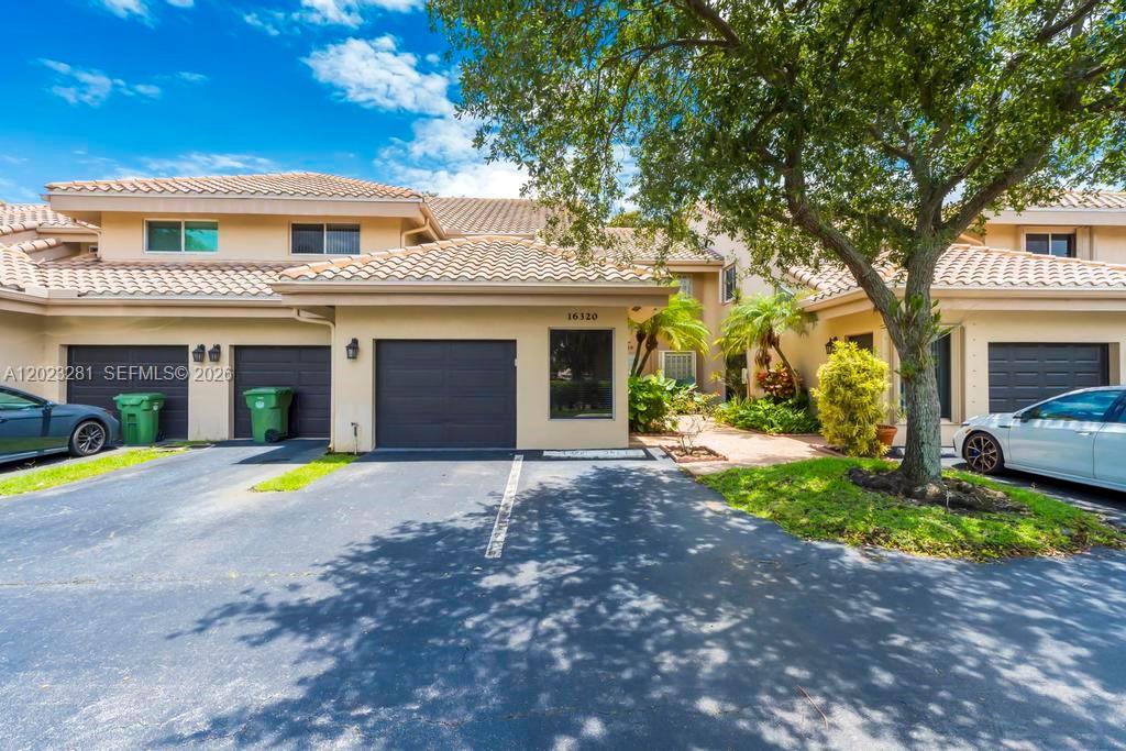 Beautiful 3-bedroom, 2-bathroom townhome with a 1-car garage located in the desirable California Courts community in Weston. This well-maintained home features an updated kitchen with quartz countertops, wood cabinetry, stainless steel appliances, and a brand-new full-size washer and dryer. Spacious floor plan with high ceilings, tile flooring throughout the main living areas, and hardwood floors in all bedrooms. The primary suite offers a large walk-in closet with custom built-ins, while the second bathroom has been tastefully remodeled. Rent includes basic cable and membership to the Bonaventure Town Center Club with access to pools, fitness facilities, tennis courts, and more. Zoned for top-rated Weston schools and conveniently located near parks, shopping, dining, and major highways. First month's rent and security deposit only to move in.