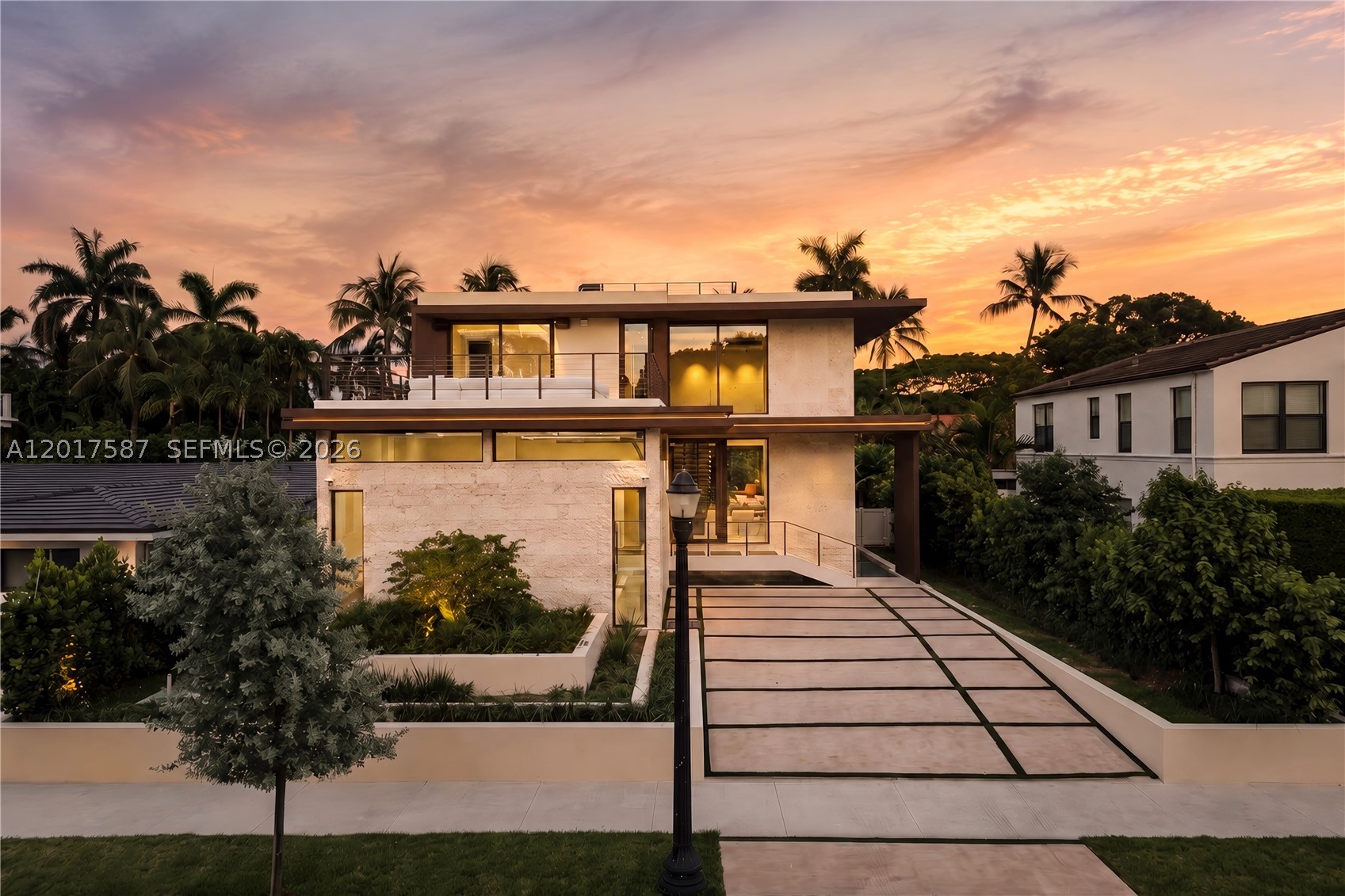 A New Architectural Statement of Modern Custom Luxury on Prestigious North Bay Road.

Completed in 2026 by Hartz Development, this newly constructed architectural residence presents a refined expression of modern luxury in one of Miami Beach's most coveted neighborhoods. Set on Lower North Bay Rd, the home spans 5,965 SF of total building area, including 3,761 SF under air, and features 4 bedrooms, 4 full bathrooms, and 1 powder room across three thoughtfully designed levels. Defined by clean architectural lines, soaring ceilings, floor-to-ceiling glass, and warm natural materials, the interiors are filled with light and seamlessly connect expansive living, dining, and entertaining spaces. A sculptural chef's kitchen with dramatic natural stone, custom wood cabinetry, premium integrated appliances, and a marble waterfall island.

The upper level is anchored by a spectacular primary suite complete with a private sitting area, oversized custom dressing room, spa-inspired bath with a freestanding soaking tub, walk-in shower, dual vanities, and a private sauna. Outdoors, lush tropical landscaping frames a resort-style pool, covered terraces, a summer kitchen, and multiple spaces designed for effortless indoor-outdoor living. Perfectly positioned on prestigious North Bay Road, just moments from Sunset Harbour, world-class dining, shopping, and Miami Beach's iconic shoreline, this exceptional residence delivers timeless architecture, privacy, and an elevated lifestyle.
