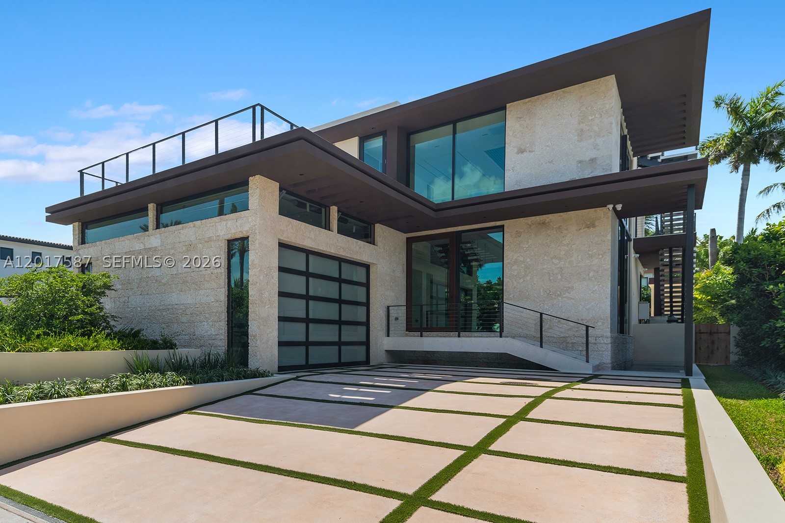 A New Architectural Statement of Modern Custom Luxury on Prestigious North Bay Road.

Completed in 2026 by Hartz Development, this newly constructed architectural residence presents a refined expression of modern luxury in one of Miami Beach's most coveted neighborhoods. Set on Lower North Bay Rd, the home spans 5,965 SF of total building area, including 3,761 SF under air, and features 4 bedrooms, 4 full bathrooms, and 1 powder room across three thoughtfully designed levels. Defined by clean architectural lines, soaring ceilings, floor-to-ceiling glass, and warm natural materials, the interiors are filled with light and seamlessly connect expansive living, dining, and entertaining spaces. A sculptural chef's kitchen with dramatic natural stone, custom wood cabinetry, premium integrated appliances, and a marble waterfall island.

The upper level is anchored by a spectacular primary suite complete with a private sitting area, oversized custom dressing room, spa-inspired bath with a freestanding soaking tub, walk-in shower, dual vanities, and a private sauna. Outdoors, lush tropical landscaping frames a resort-style pool, covered terraces, a summer kitchen, and multiple spaces designed for effortless indoor-outdoor living. Perfectly positioned on prestigious North Bay Road, just moments from Sunset Harbour, world-class dining, shopping, and Miami Beach's iconic shoreline, this exceptional residence delivers timeless architecture, privacy, and an elevated lifestyle.
