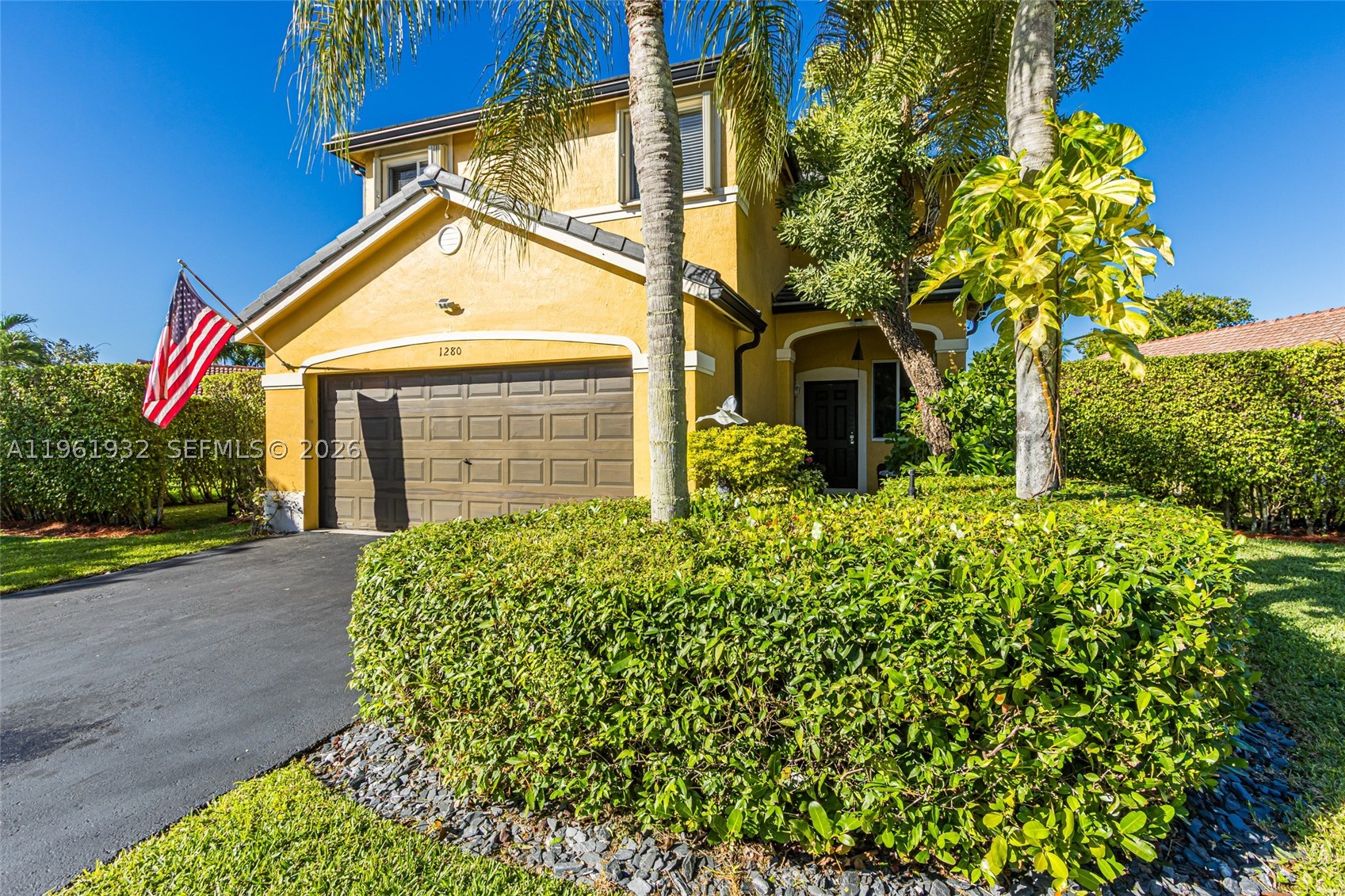 NEW ROOF. DOWNSTAIRS PRIMARY SUITE. FLEX ROOM. NEARLY 2700 SQ FT IN SAVANNA. What if your next home checked every box? This beautifully maintained 4-bedroom + flex room, 2.5-bath residence in Savanna offers nearly 2,700 sq. ft. of thoughtfully designed living space, featuring a brand-new concrete tile roof and new gutters (July 2025) for added peace of mind. The updated kitchen opens to bright, inviting living areas perfect for entertaining and everyday living. The spacious first-floor primary suite provides comfort and convenience, while generously sized secondary bedrooms offer privacy for family and guests. Need extra space? The versatile flex room is ideal for a home office, gym, media room, or playroom. One of this home's most desirable features is its sense of privacy. Mature hedges surround the backyard, creating a secluded setting. At the same time, the pie-shaped lot and thoughtful positioning of the home provide a rare feeling of openness—you won't be looking directly into your neighbors' windows. Whether enjoying your morning coffee or unwinding at the end of the day, you'll appreciate the peaceful, private atmosphere. Upstairs accordion hurricane shutters make storm preparation effortless. Located in one of Weston's most sought-after gated communities, you're just minutes from I-75 shopping, dining, parks, and top-rated schools. Homes offering this combination of updates, space, and privacy rarely become available—schedule your private showing today.