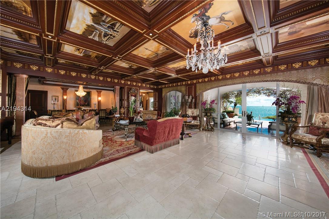 This spectacular ground floor center stack residence is a work of art. +/-7,696 SF of interior space w/expansive +/-5,300 SF terrace , private Infinity pool, Jerusalem stone floors flowing through the open living & family areas, custom bar, formal dining, Chef's kitchen w/top appliances and breakfast area. Hand painted wall & ceiling murals adorn this treasure throughout. Mesmerizing beach/ocean & Gov. Cut views. Maintenance fee is +/-$5,379.74 per month. FICA fee is $6,729.76 per quarter.