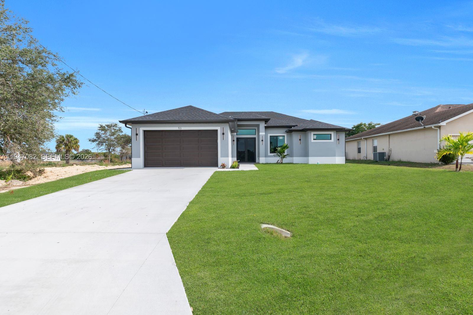 Discover exceptional value in this stunning new construction home nestled within the desirable Lehigh Acres community, where modern living meets thoughtful design across 1,531 square feet of meticulously crafted space. This three-bedroom+den, two-bathroom residence showcases contemporary architecture and premium finishes that reflect superior building quality throughout every corner of the home. The heart of this residence features an inviting formal dining room, perfect for hosting memorable gatherings and intimate dinner parties. The primary bedroom serves as a tranquil retreat, complementing three additional well-appointed bedrooms that offer flexibility for family living, home offices, or guest accommodations. Two thoughtfully designed bathrooms provide convenience and style for busy households. Step outside to discover your personal entertainment paradise with a fully equipped outdoor kitchen, ideal for year-round Florida living and alfresco dining experiences. The washer and dryer inclusion adds practical value, ensuring move-in convenience without additional appliance investments. Location advantages abound in this vibrant neighborhood, where residents enjoy proximity to... -----Refer to SUPPLEMENTAL REMARKS FOR COMPLETE DESCRIPTION!!!!