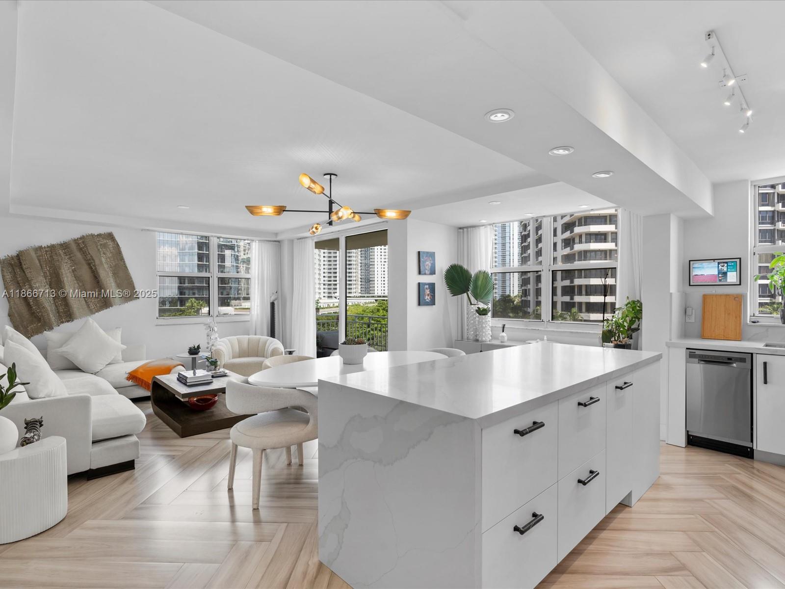 Exquisite 2/2 fully furnished turnkey corner residence with Bay and City views. Fully renovated with new plumbing, electrical, and lighting throughout, this home features custom built-ins, a sleek and functional kitchen w/ a Bar, custom closets, windows sheers and black-out w/ side channels, and new impact sliding balcony door. Smart Door Lock & A/C.

Located on the prestigious private island of Brickell Key, offering beautiful landscaping, restaurants, café, marketplace, dog park, jogging path, and more. The building has been completely remodeled, with a fantastic new pool, BBQ, and spacious Deck. Enjoy resort-style living with 24-hour concierge, valet, security, tennis courts, heated pool & spa, waterfront new gym, club room, business center & more. Includes two assigned parking spaces