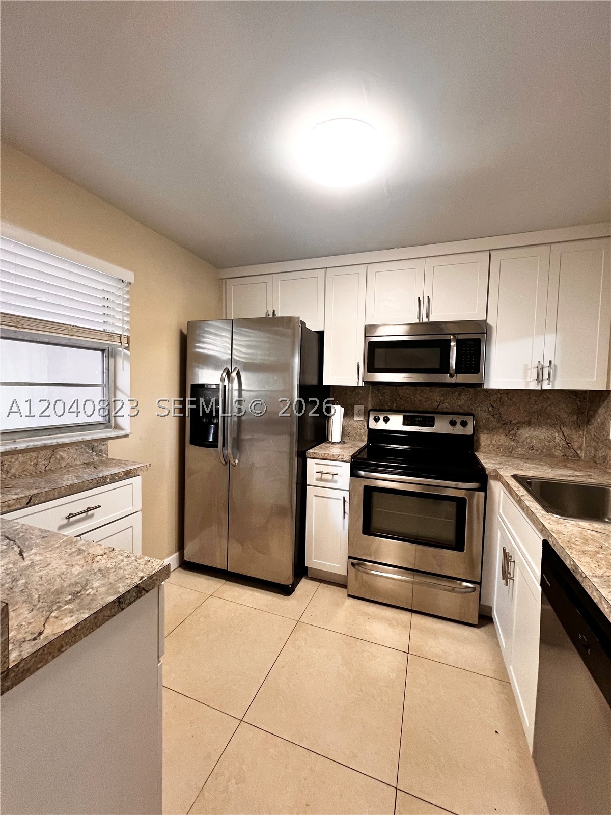 This gorgeous, updated 2-bedroom, 2-bathroom first-floor unit is perfectly nestled on the golf course in the highly desired Pine Island Ridge community. Zoned for top A -rated schools, this retreat offers resort-style country club living with unbeatable ammenites such as full gym, swimming pool, library, tennis  pickleball courts and much much more! it is within close proximity to Nova Southeastern University, beaches, major sports complexes, all major highways and local dining! You'll never have to leave your community!