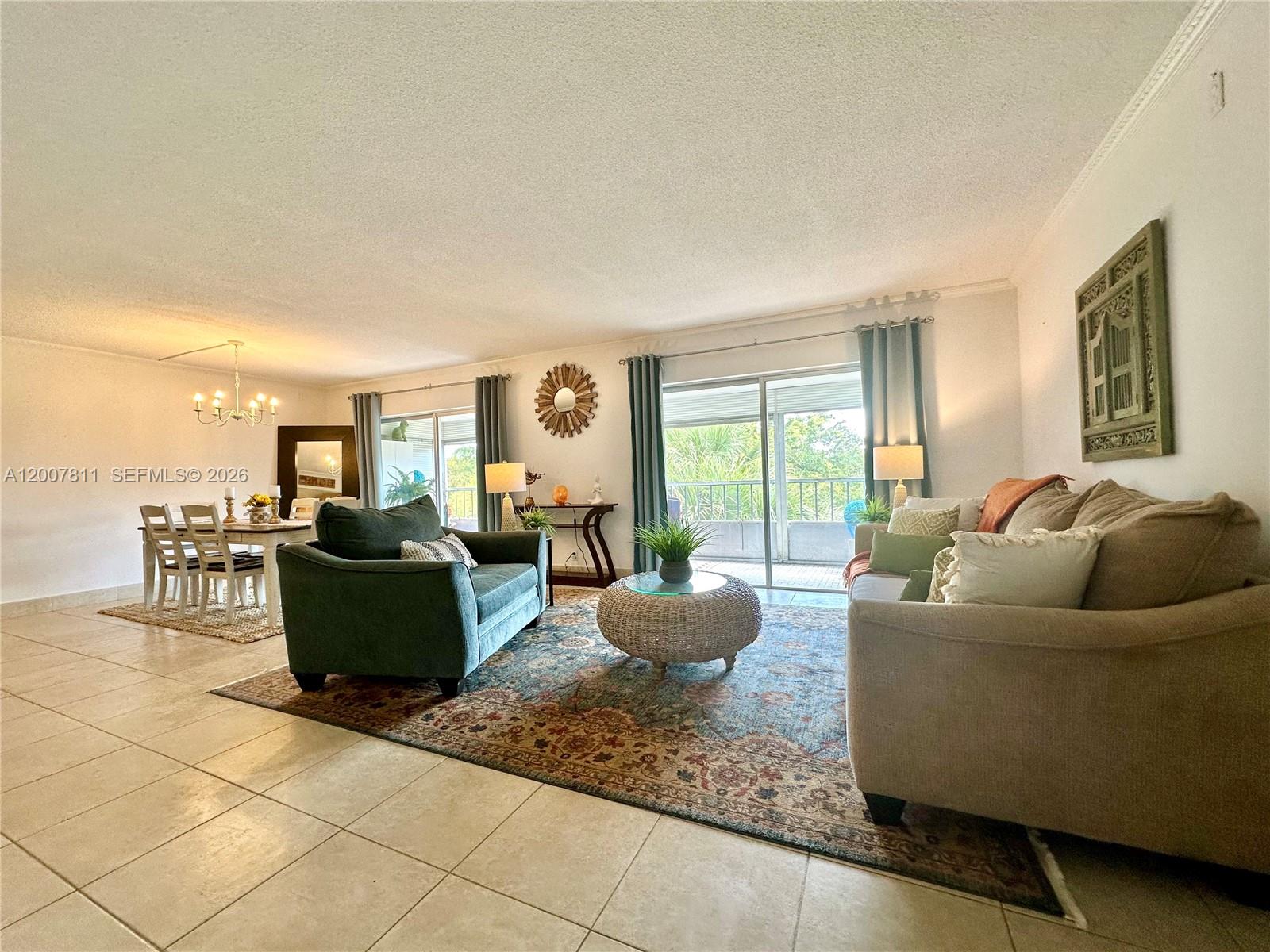 Rarely available well-maintained 3-bedroom 3.5-bathroom condo in Hillcrest Country Club, Hollywood. The 1,519 Sq.Ft. unit features tile flooring throughout, an open-concept kitchen with granite countertops, and stainless-steel appliances. Each of the three bedrooms includes its own en-suite bathroom. Unwind on your large screened balcony, with roll-down shutters. The home is ready for your personal touch and sold As Is.  All ages welcome. No rentals or pets are permitted. Great amenities such as a laundry facility, clubhouse, fitness center, pools, tennis and pickleball courts, beautifully maintained parks, and a BBQ area. Conveniently located near major highways and just minutes from downtown Hollywood, Fort Lauderdale Airport, Aventura, Gulfstream Park, and pristine beaches.