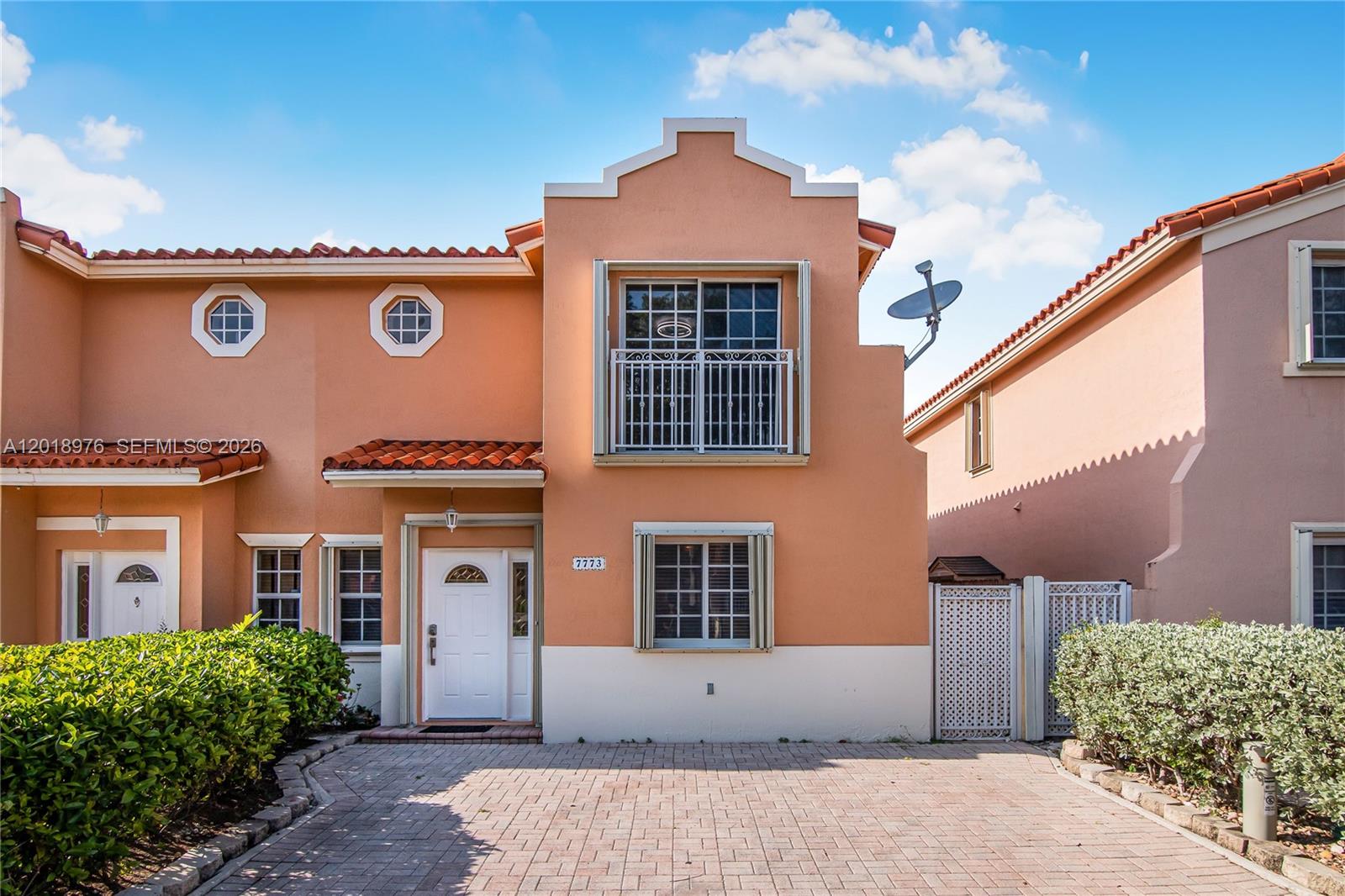 Welcome to this spacious and tastefully updated residence located in the desirable gated community of Villas of Barcelona. Offering a flexible floor plan, this home features two oversized primary suites upstairs, each with its own private bathroom and walk-in closet. The second floor also includes a conveniently located washer and dryer area with additional storage space.

The first floor features a full bathroom and a versatile space where the owner is offering the option to enclose a third bedroom for added privacy or functionality. The updated open-concept kitchen is designed for both everyday living and entertaining, showcasing granite countertops, a large kitchen island, modern light fixtures, and seamless flow into the dining and living areas. Additional storage can also be found underneath the staircase.

French doors open to a spacious and private patio, perfect for relaxing or entertaining outdoors. The unit features tile flooring throughout, two exterior storage sheds, and two assigned parking spaces directly in front of the property, along with ample guest parking nearby. For added peace of mind, the home is equipped with accordion shutters on all doors and windows.

Residents enjoy resort-style amenities just steps away, including the clubhouse, pool, gym, jacuzzi, dog park, and playground located across the street. Ideally situated near top-rated schools, Baptist Hospital of Miami, Dadeland Mall, the Metrorail, Palmetto Expressway, shopping, and dining.