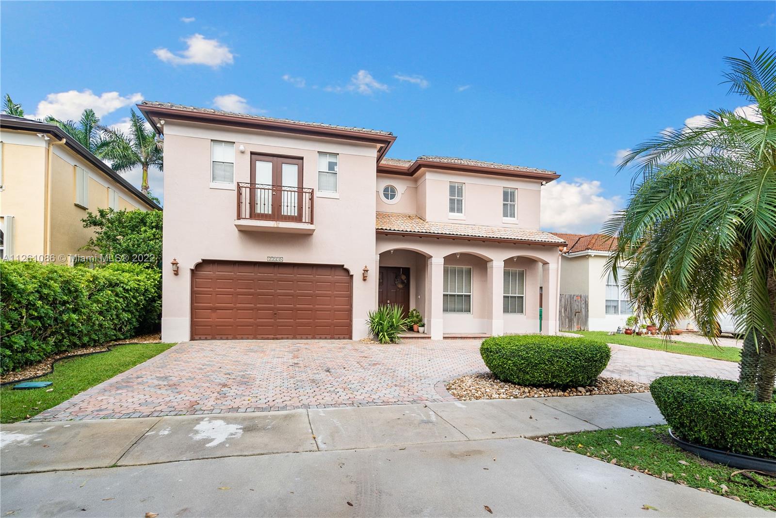 Beautiful two-story pool home located in a desirable Kendall neighborhood with NO HOA (save on monthly fees, decorate to your liking!). Pulling into your circular driveway, walking through your spacious family area with high ceilings and strolling through the glass doors and into your pool or huge master bedroom with balcony will give you a sense of style and luxury normally found in properties in much higher price ranges. Minutes to new and upcoming shopping centers but secluded enough to be a quiet and relaxing neighborhood. Layout features three bedrooms and two bathrooms upstairs and one bedroom and bathroom (with direct pool access) downstairs (total 4/3), perfect for guest room or office. Circular driveway with 2-car garage, pool with covered balcony, fenced patio. Won't last!