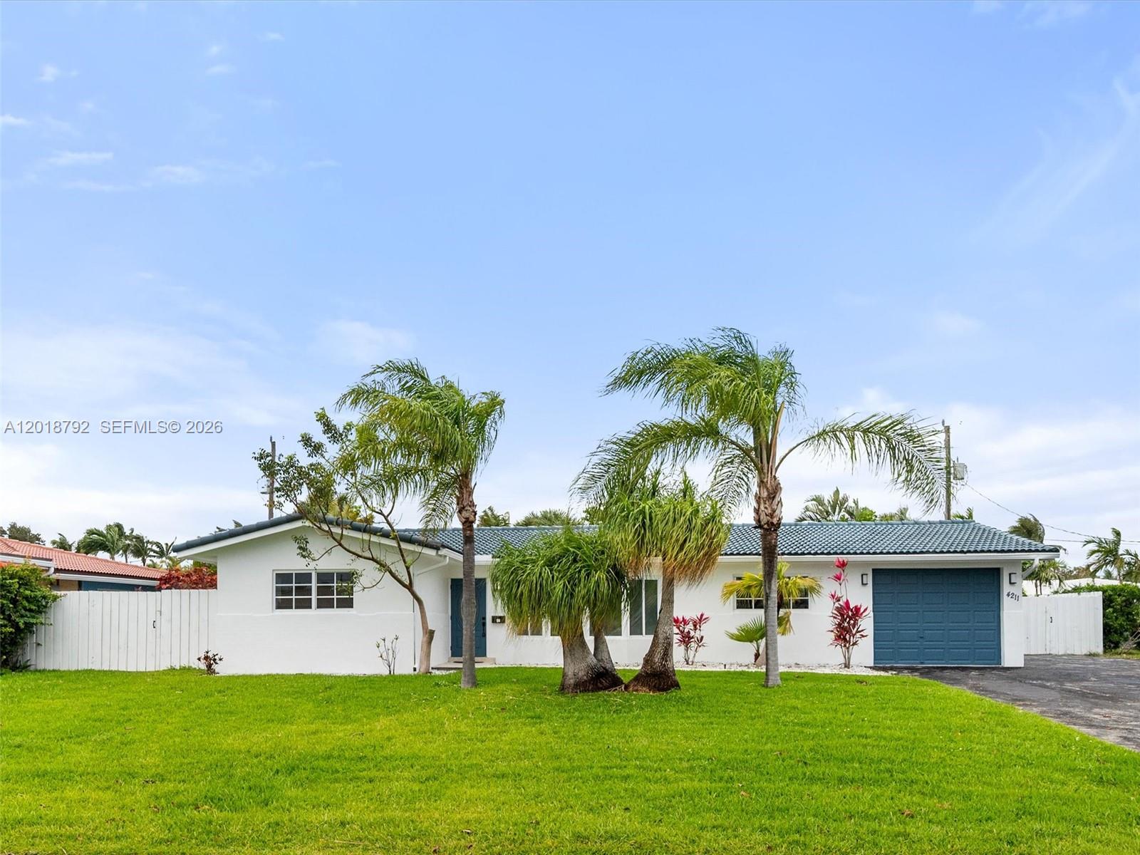 Beautiful and spacious 4-bedroom, 3-bath pool home located in the highly desirable Venetian Isles community. This updated residence features stainless steel appliances, porcelain flooring throughout, renovated kitchen and baths, dual sinks in the spacious primary bathroom, recessed hi-hat lighting, and modern flat ceilings. The open-concept layout is perfect for entertaining and everyday living. Step outside to a very large fully fenced backyard with plenty of room for a boat and enjoy your private pool oasis. Conveniently located near the beach, yacht club, and fine dining. a true must see