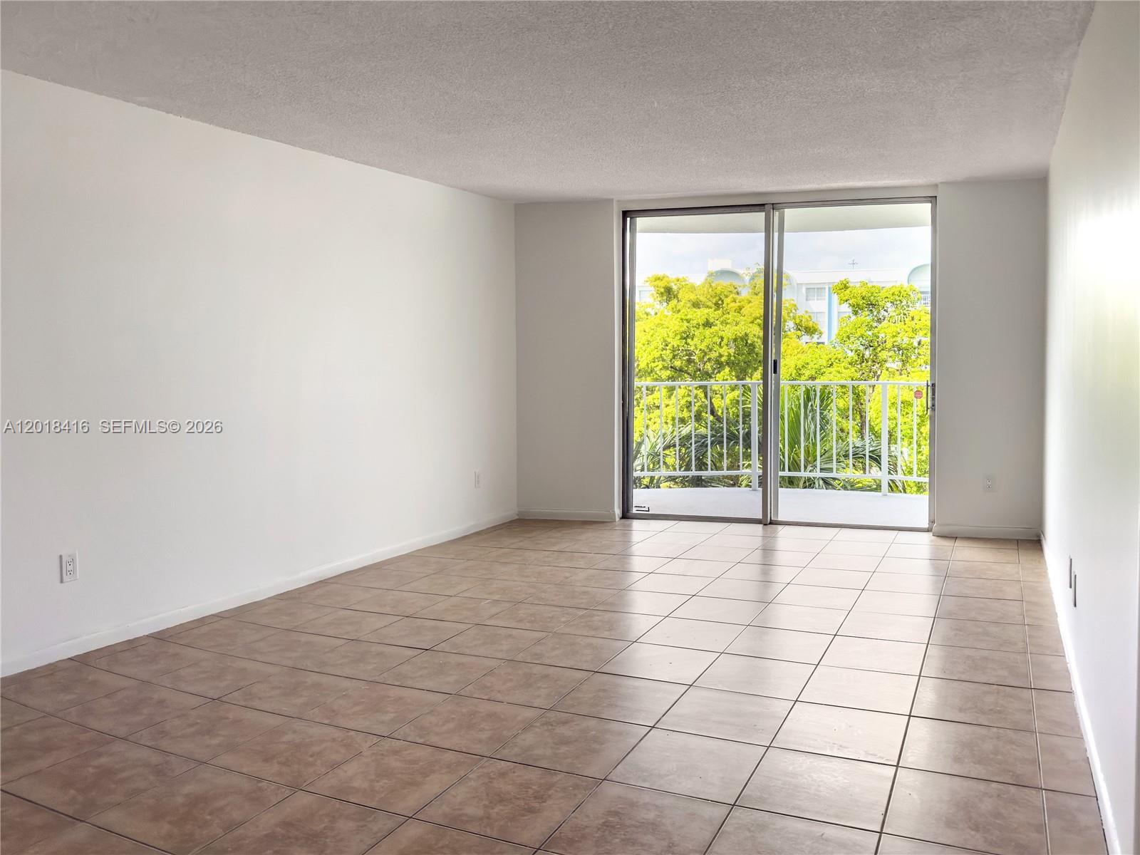 Comfortable 1-bedroom, 1-bath apartment with a smart, functional layout. The unit offers a spacious walk-in closet, a practical kitchen with ample cabinetry, and a bright, inviting living area. The bedroom is well-sized and provides a peaceful retreat. Ideally located close to shopping, restaurants, and major roads, making daily living effortless. A perfect choice for those seeking a clean, low-maintenance home with great convenience. No rental restrictions, perfect for investors