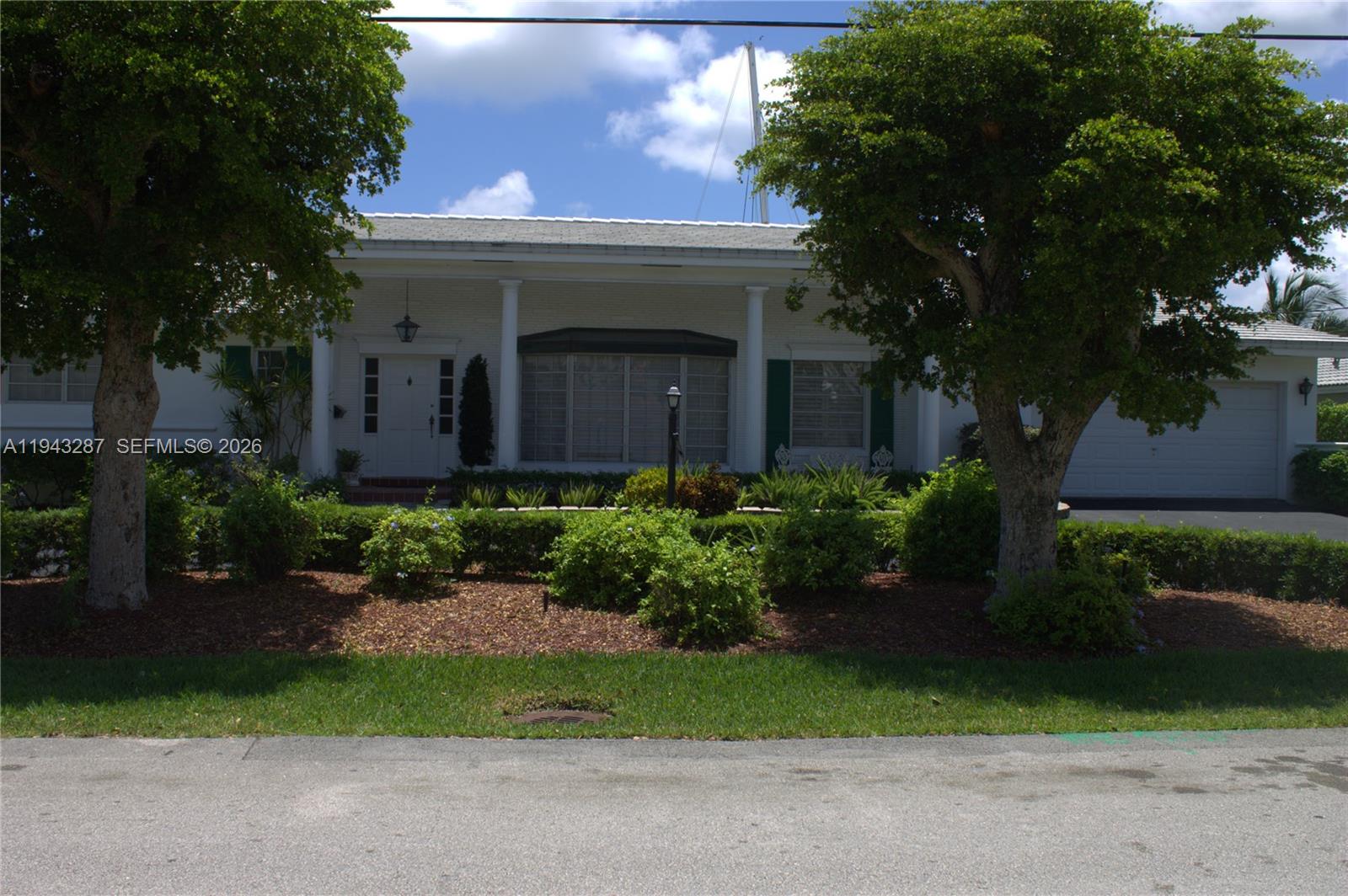 Colonial customer home in gated community of Easter Shores.Water front property providing a boaters paradise with direct ocean access and no fixed bridges to Haulover Inlet. Home features a split floorplan and new roof of only five years old. Rear Southern exposure provides pool area year round sun and predominantly southeast breezes. Large driveway provinding up to ten parking spaces as well as the two car garage. Home is only minutes drive from the beach as well as renowned Aventura Mall, Bal Harbour Shops, Oleta State Park as well. Location, Location, Location!